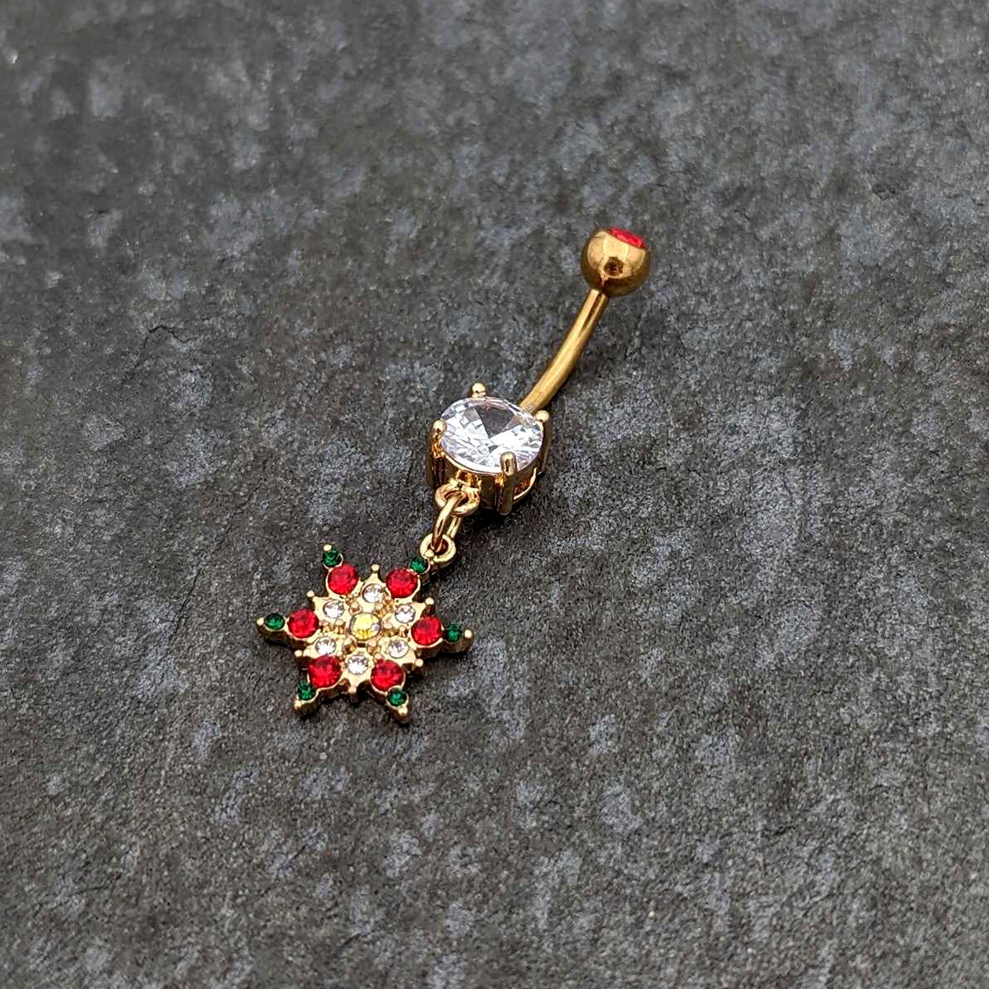 BodyCandy Aurora Red Green Gem Gold Tone Christmas Star Holiday Dangle Belly Ring — side view