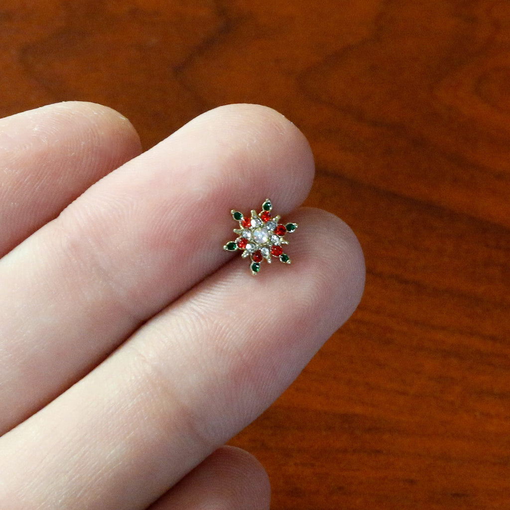 BodyCandy 16G 1/4 Red Aurora Gem Gold Tone Christmas Star Labret Tragus — in-use photo