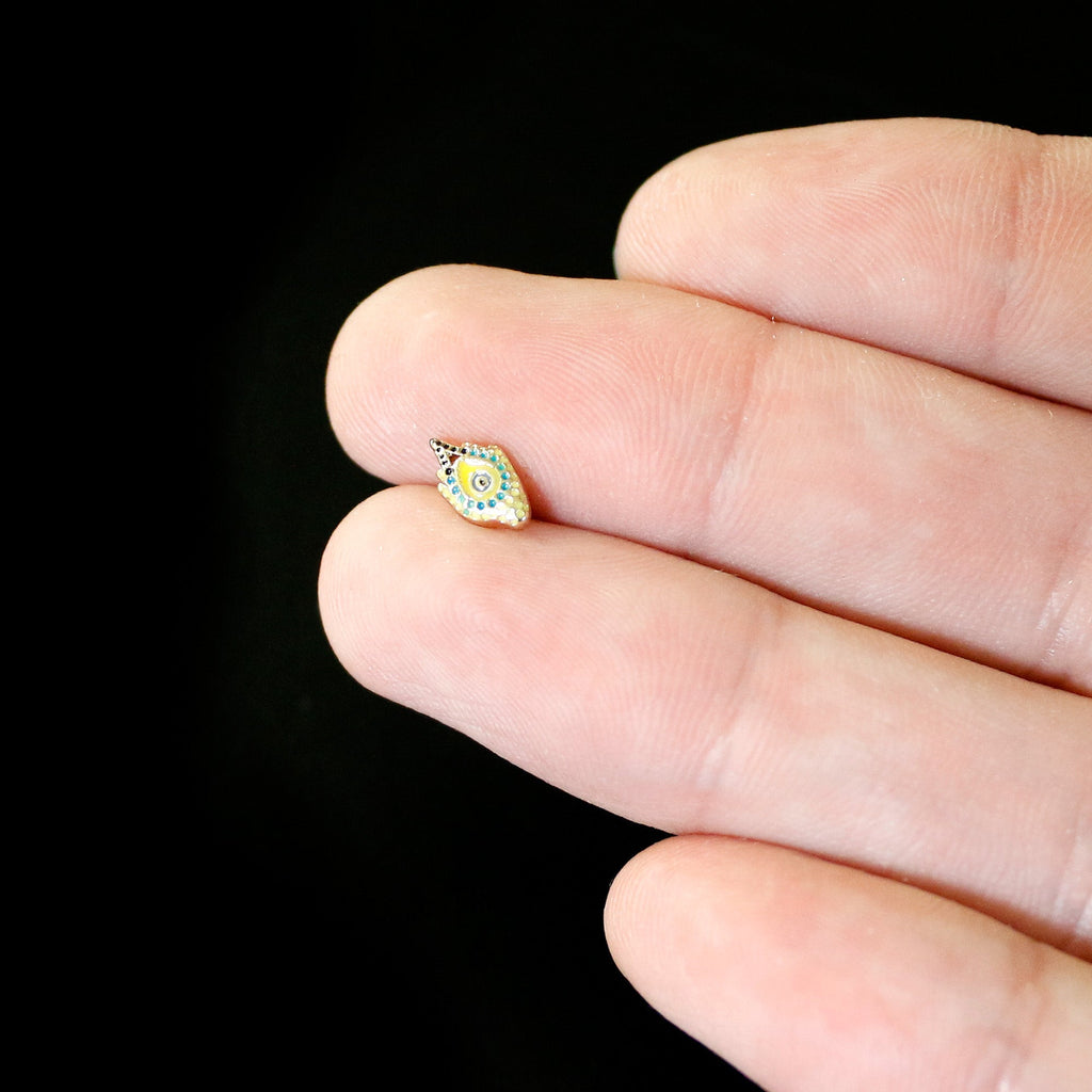 BodyCandy 16G 5/16 Gold Tone Bold Peacock Feather Labret Monroe Tragus — in-use photo