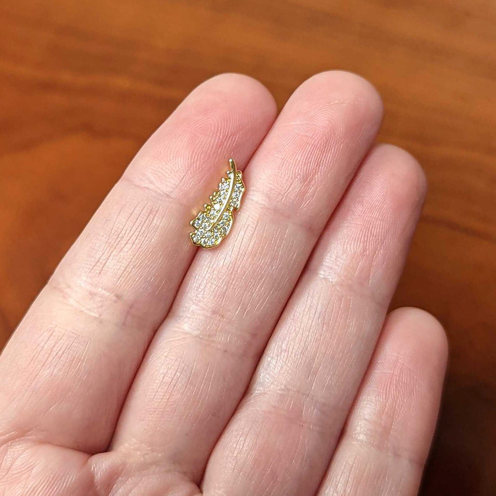 BodyCandy 16G 5/16 Clear CZ Gem Gold Hue Feather Internal Thread Labret Tragus — back view