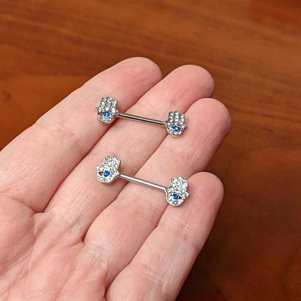 BodyCandy 14G 9/16 Clear Blue Gem Eye Hamsa Hand Barbell Nipple Ring Set — side view
