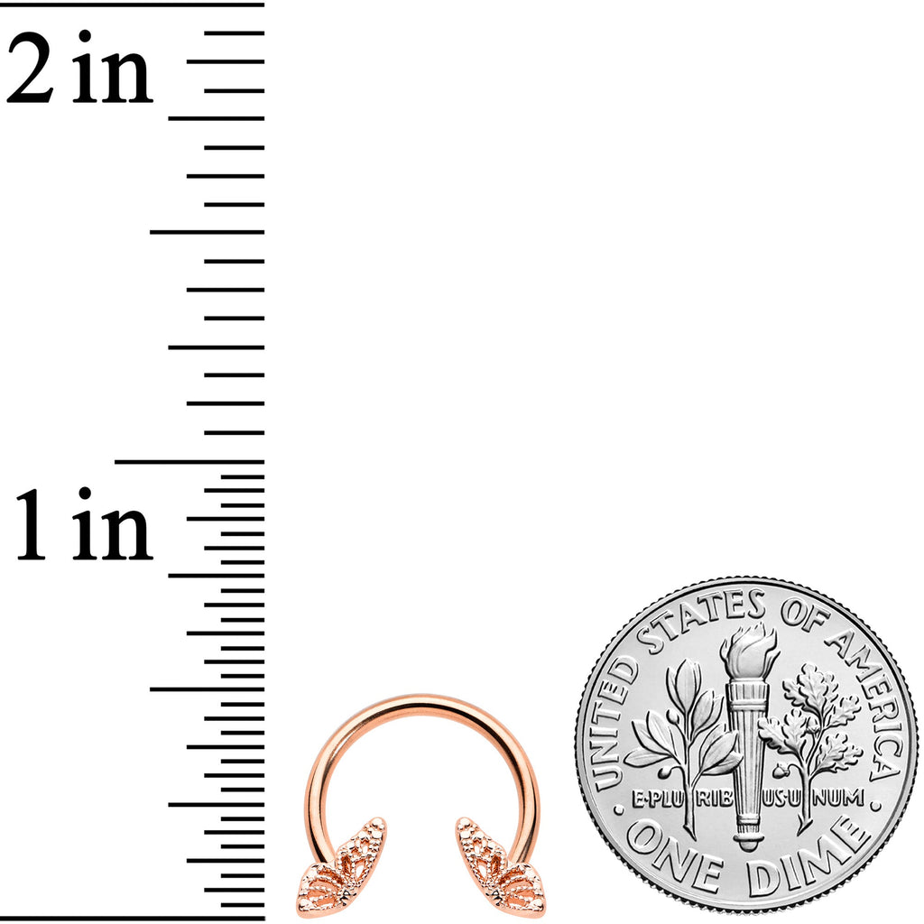 BodyCandy 16G 3/8 Rose Gold Hue Texture Butterfly Horseshoe Circular Barbell — lifestyle context