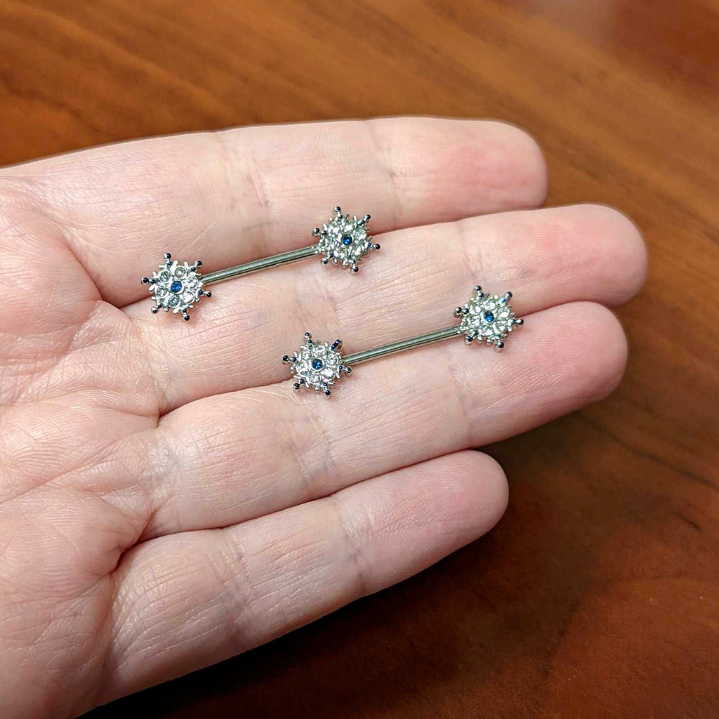BodyCandy 14G 9/16 Blue Gem Festive Snowflake Christmas Nipple Ring Set — side view