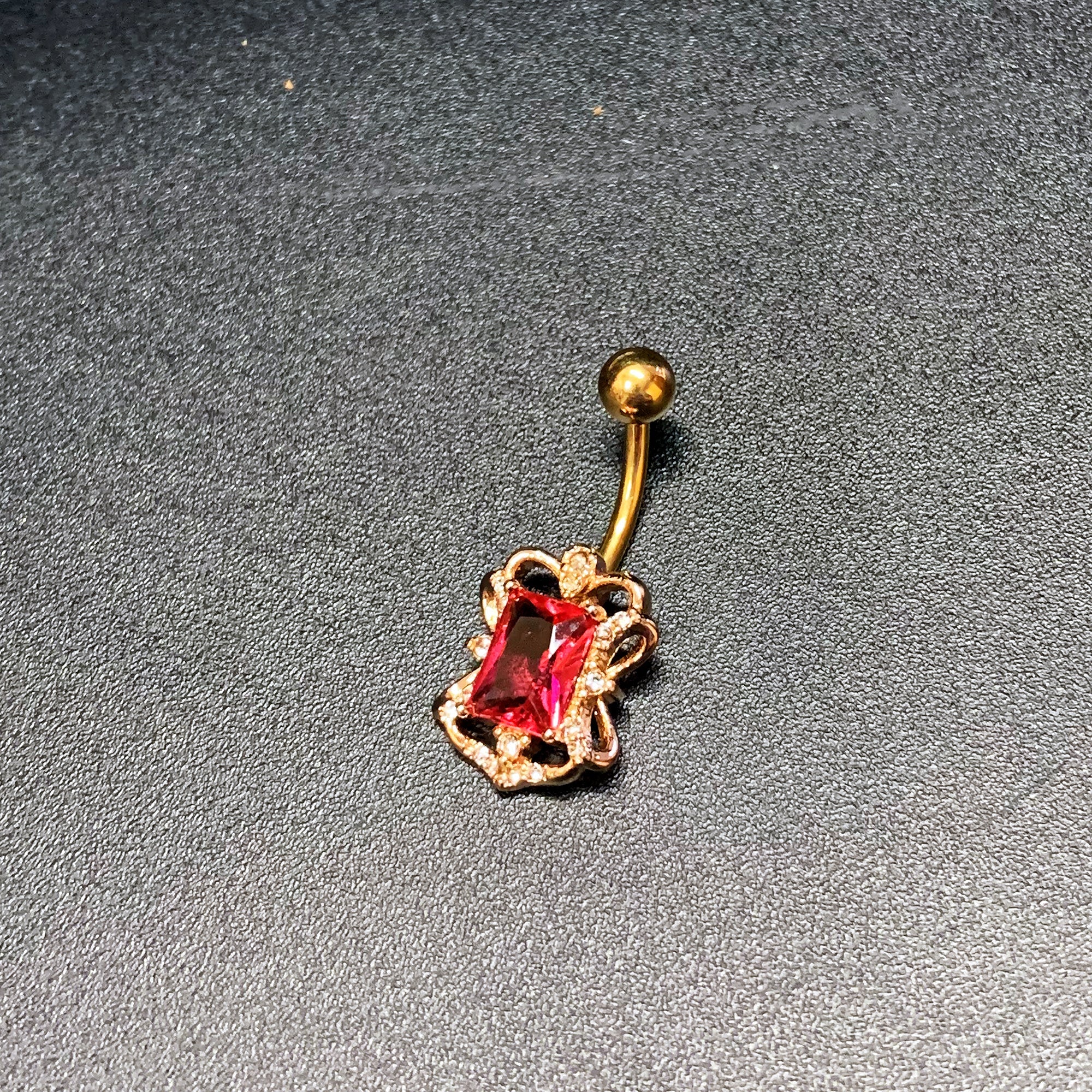 BodyCandy Clear Pink Gem Gold Tone Open Oblong Elegant Belly Ring — side view