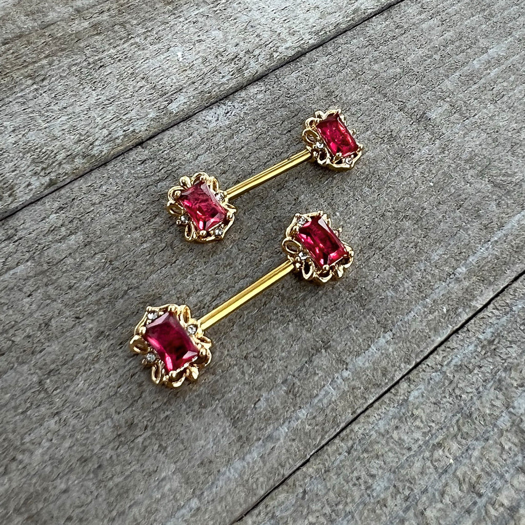 BodyCandy 14G 9/16 Red Gem Gold Hue Regal Escutcheon Barbell Nipple Ring Set — side view
