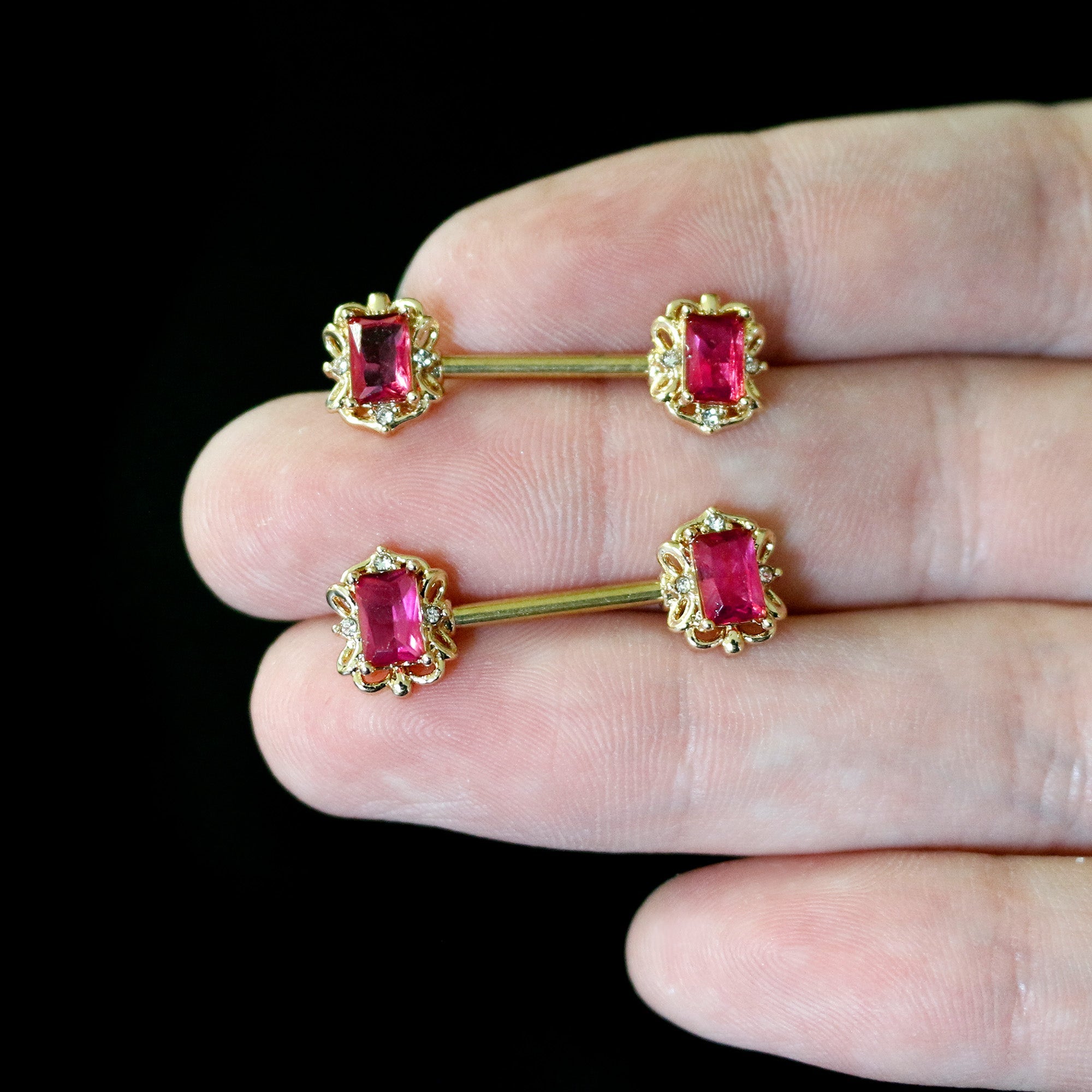 BodyCandy 14G 9/16 Red Gem Gold Hue Regal Escutcheon Barbell Nipple Ring Set — back view