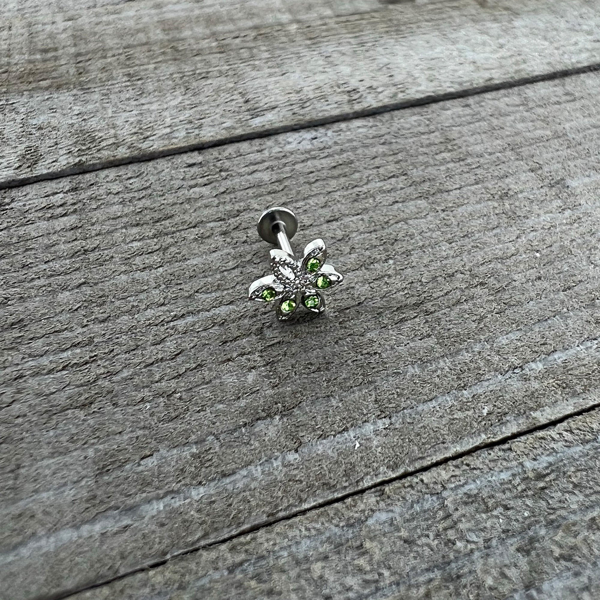 BodyCandy 16G 5/16 Green Gem Textured Pot Leaf Labret Monroe Tragus — back view