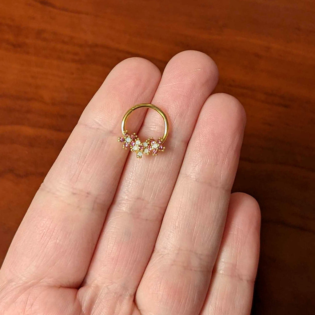 BodyCandy 16G 3/8 White Faux Opal Gold Hue Bunch Flower Hinged Segment Ring — side view