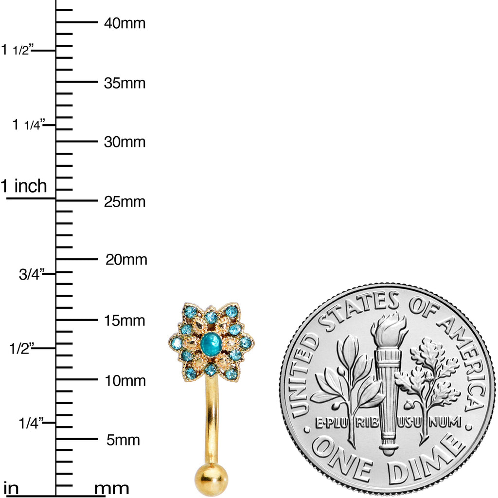 BodyCandy 16G 5/16 Blue Gem Gold Tone Snowflake Christmas Eyebrow Ring — lifestyle context