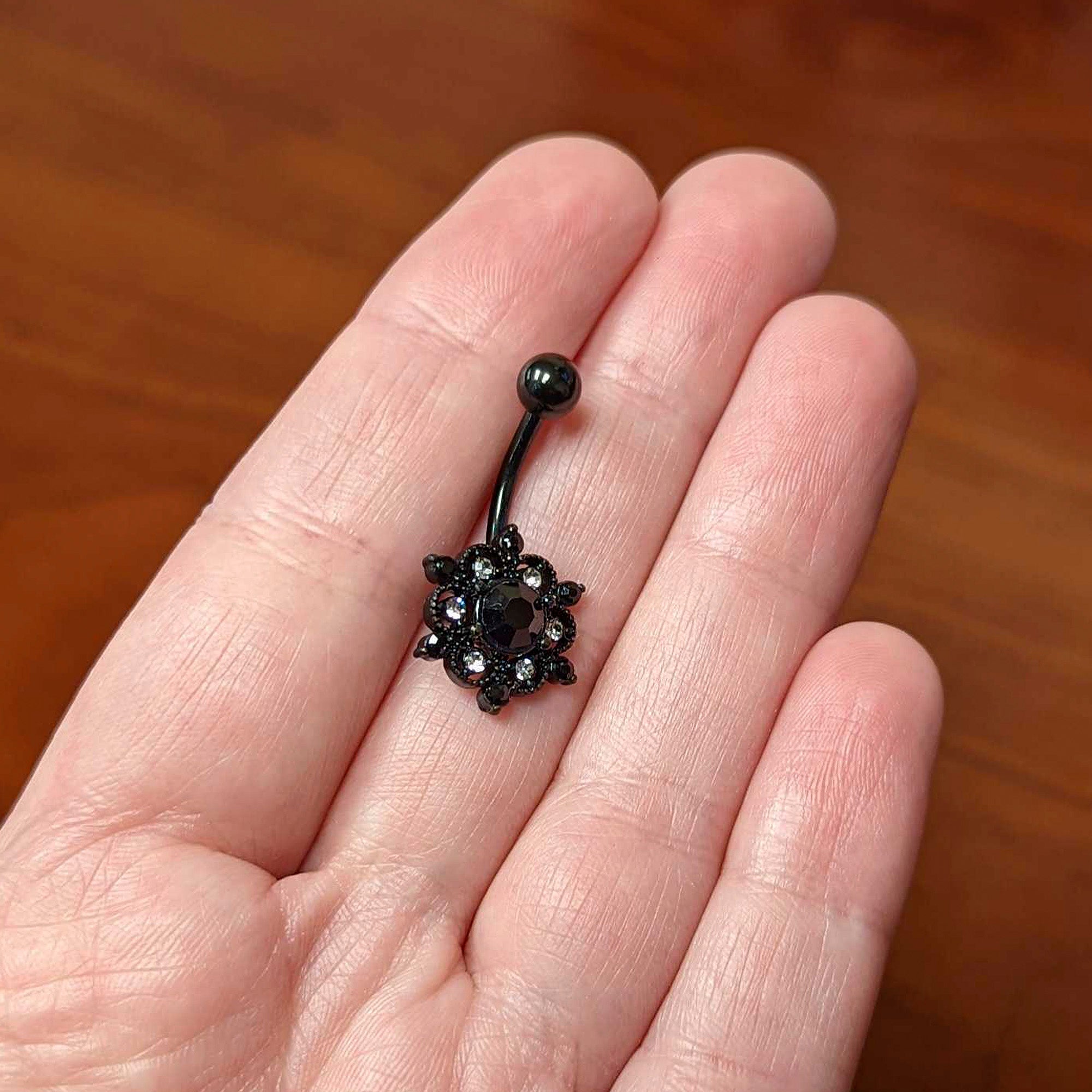 BodyCandy Clear Black CZ Gem Black Abstract Sun Belly Ring — lifestyle context