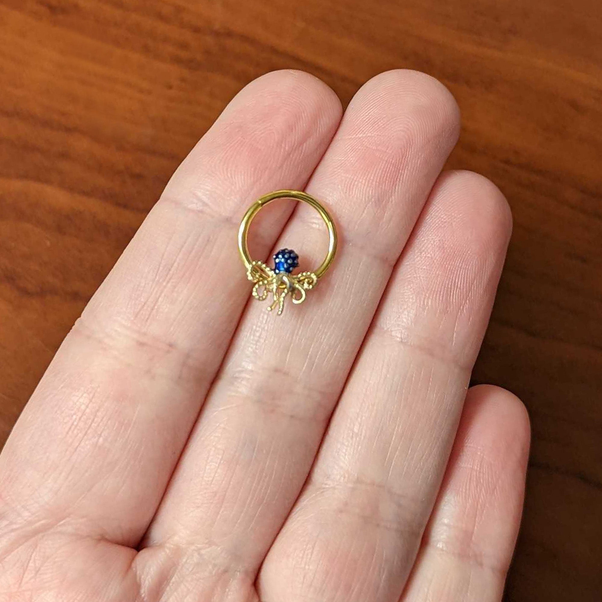 BodyCandy 16G 3/8 Gold Tone Textured Blue Octopus Hinged Segment Ring — side view