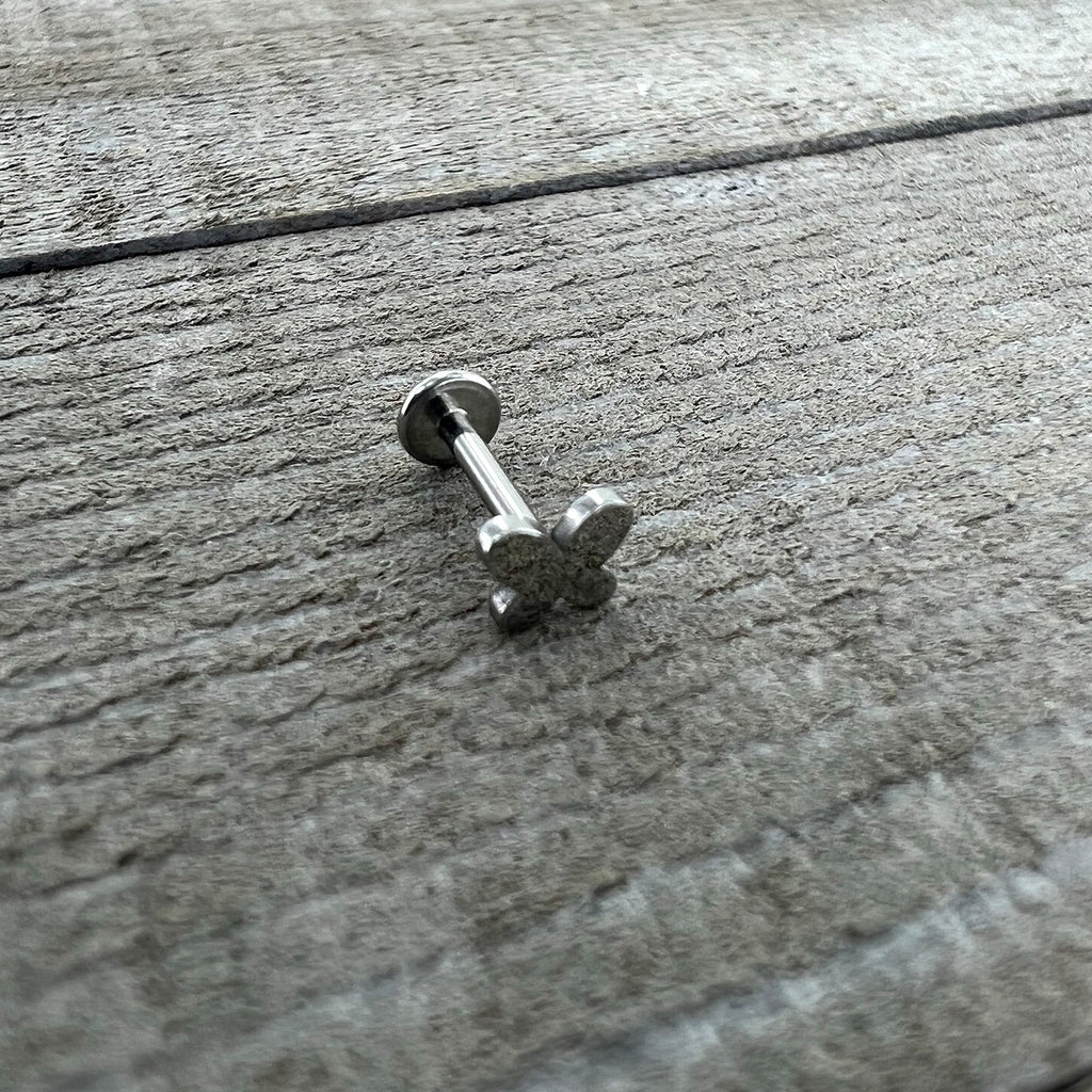 BodyCandy 16G 5/16 Simple Butterfly Internally Threaded Labret Monroe Tragus — in-use photo