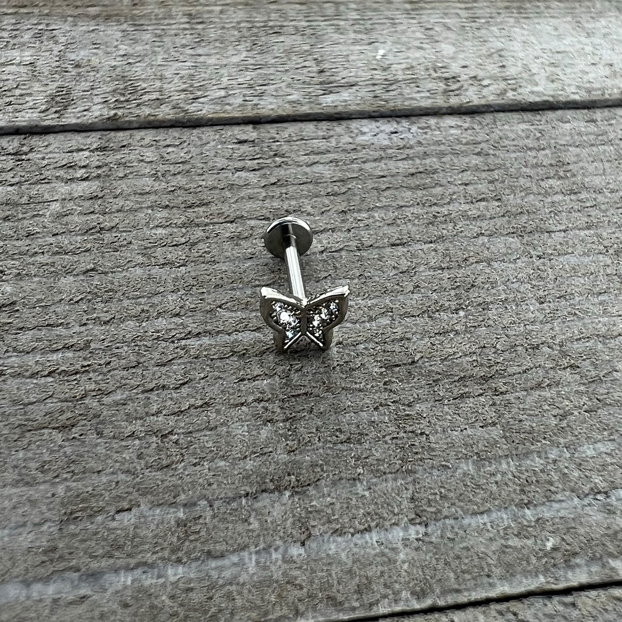 BodyCandy 16G 5/16 Clear Gem Butterfly Internally Threaded Labret Tragus — in-use photo