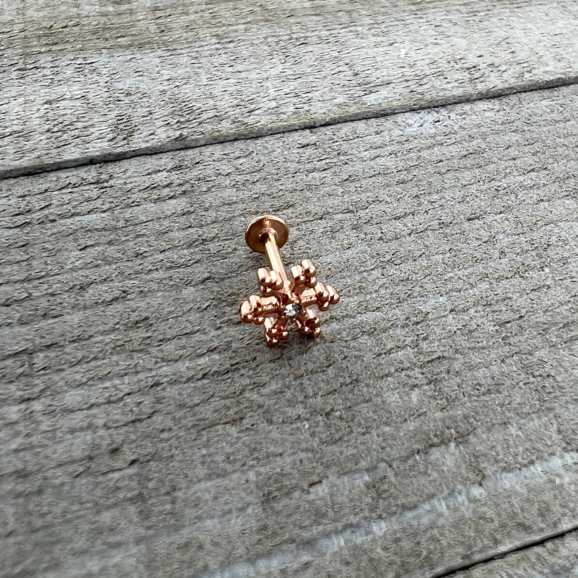 BodyCandy 16G 5/16 Clear Gem Rose Gold Tone Snowflake Labret Monroe Tragus — back view