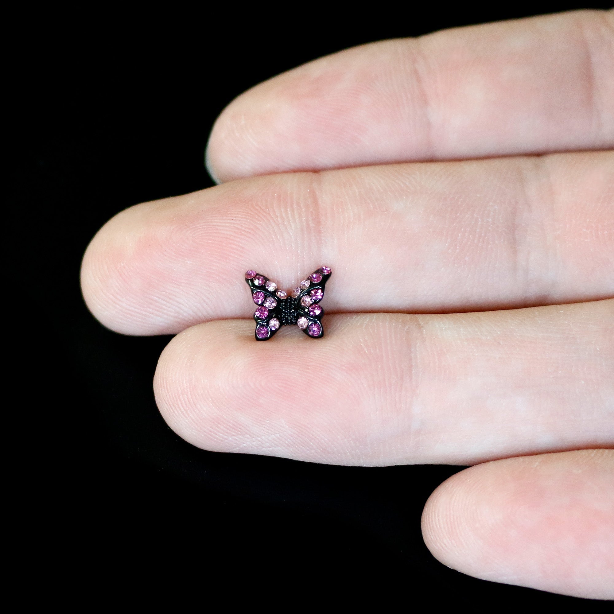 BodyCandy 16G 5/16 Pink Gem Black Midnight Butterfly Labret Monroe Tragus — in-use photo