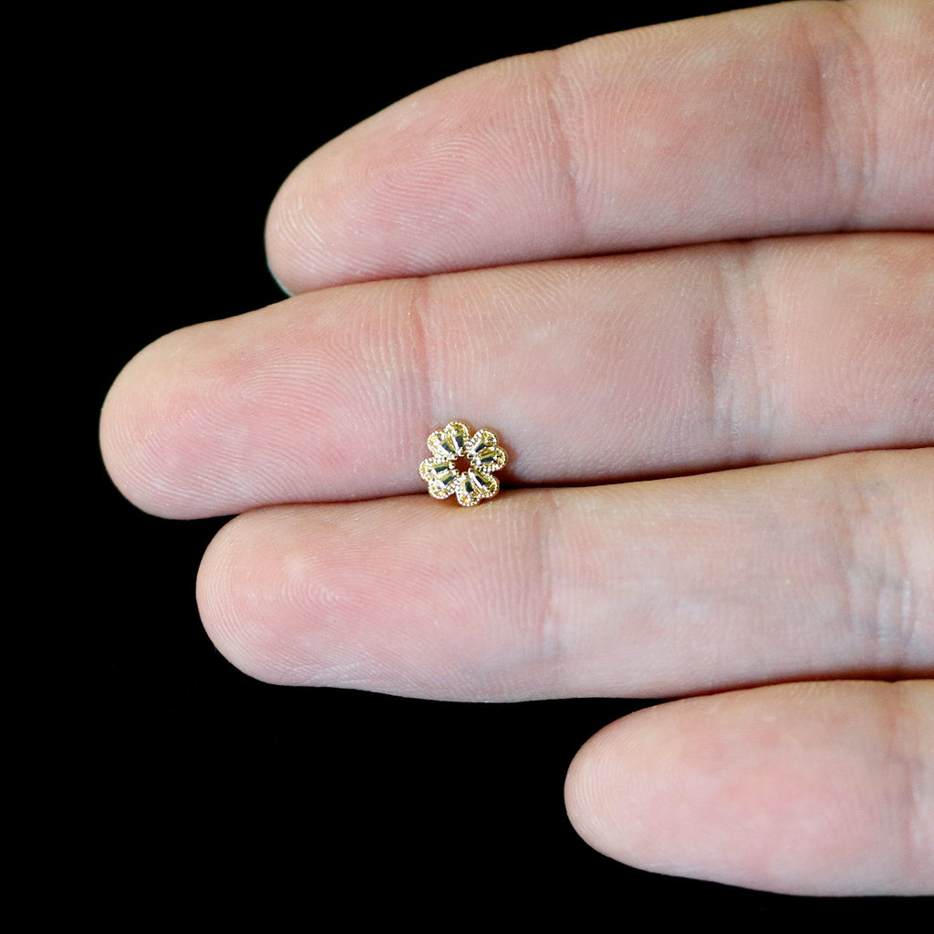 BodyCandy 16G 5/16 Yellow Gem Gold Tone Textured Cross Labret Monroe Tragus — in-use photo