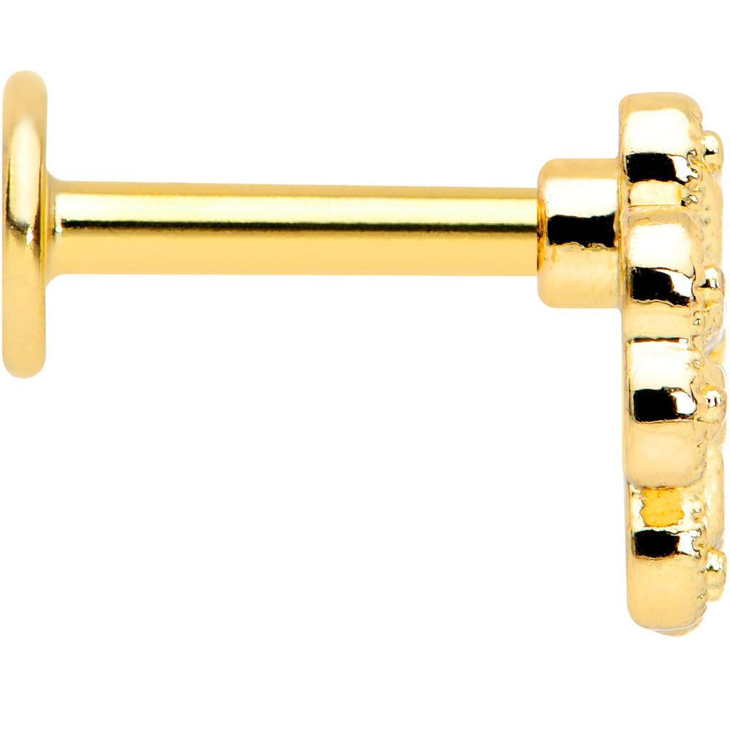 BodyCandy 16G 1/4 Yellow Gem Gold Tone Textured Cross Labret — lifestyle context
