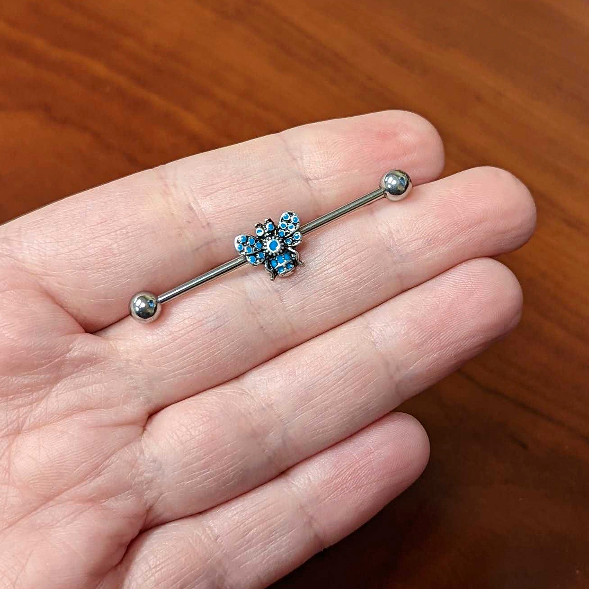 BodyCandy 14G Texture Blue Butterfly Industrial Barbell 38mm — lifestyle context
