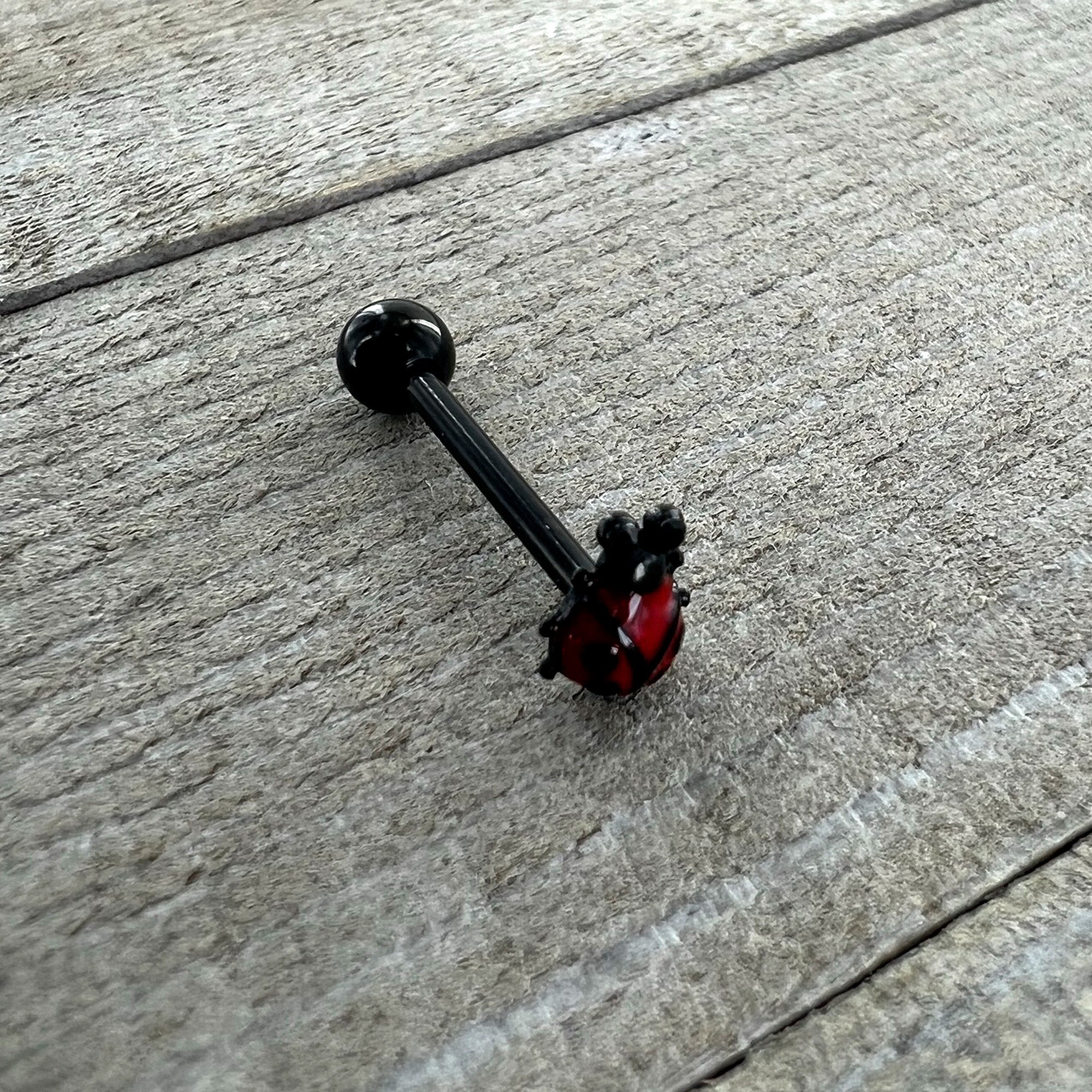 BodyCandy Black Classic Ladybug Top End Barbell Tongue Ring — in-use photo