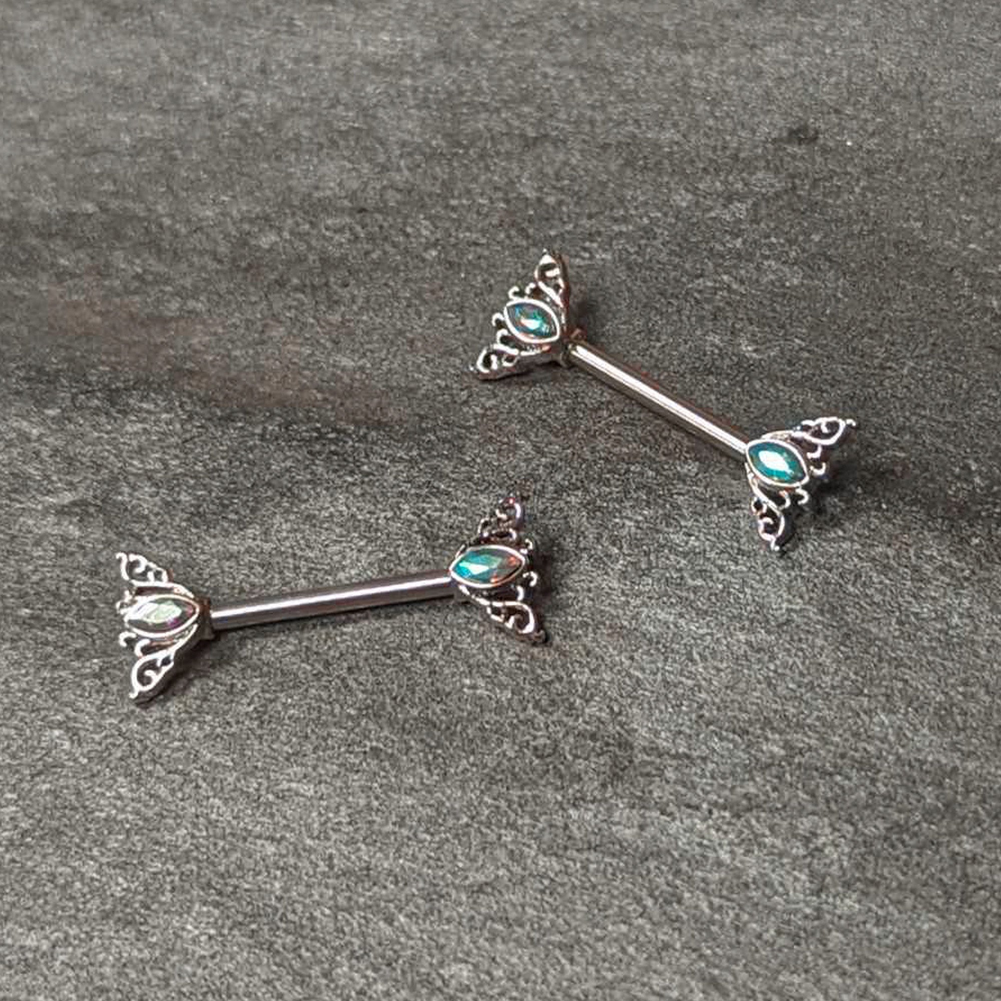 BodyCandy 14G 9/16 Aurora Gem Deco Waves Barbell Nipple Ring Set — side view