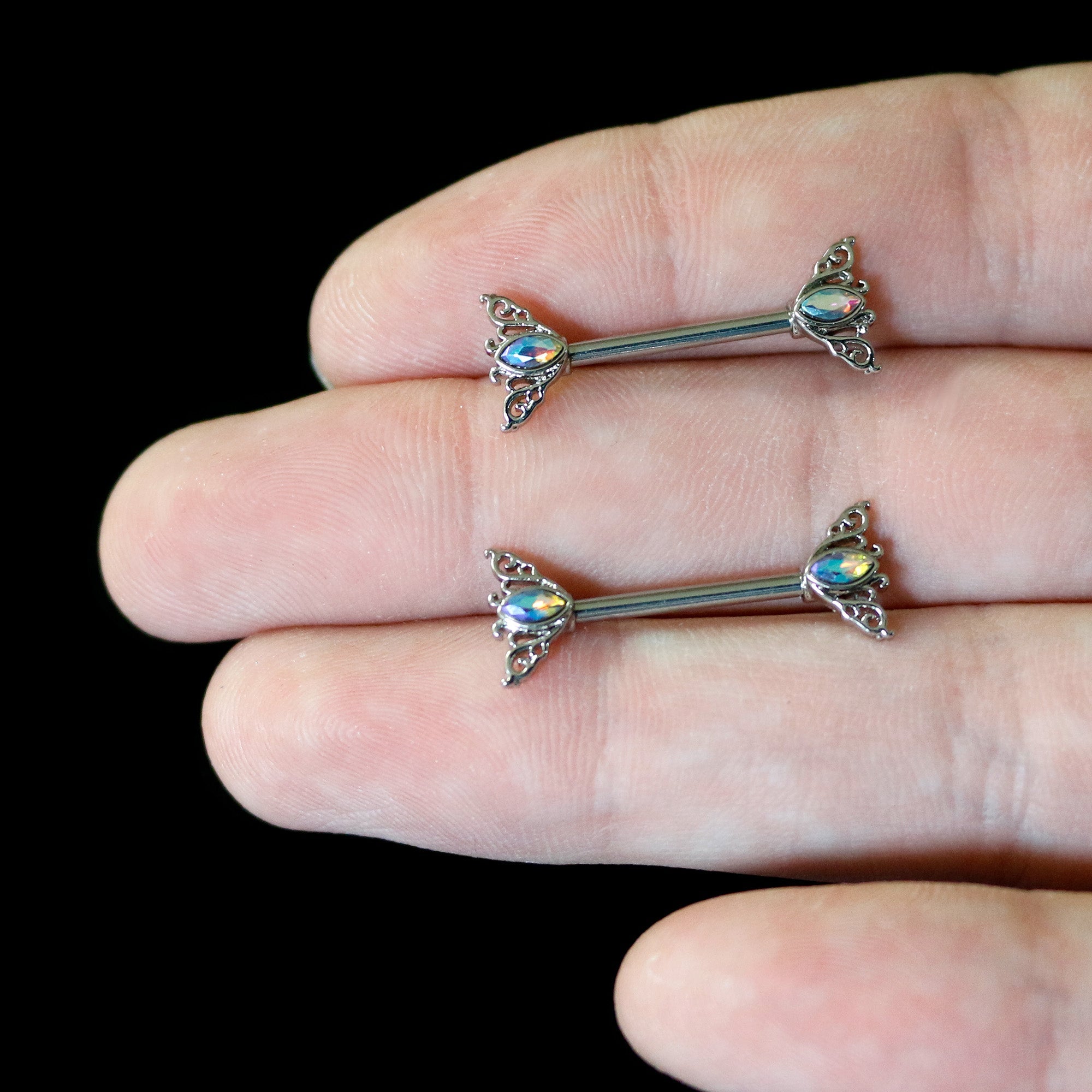 BodyCandy 14G 9/16 Aurora Gem Deco Waves Barbell Nipple Ring Set — in-use photo
