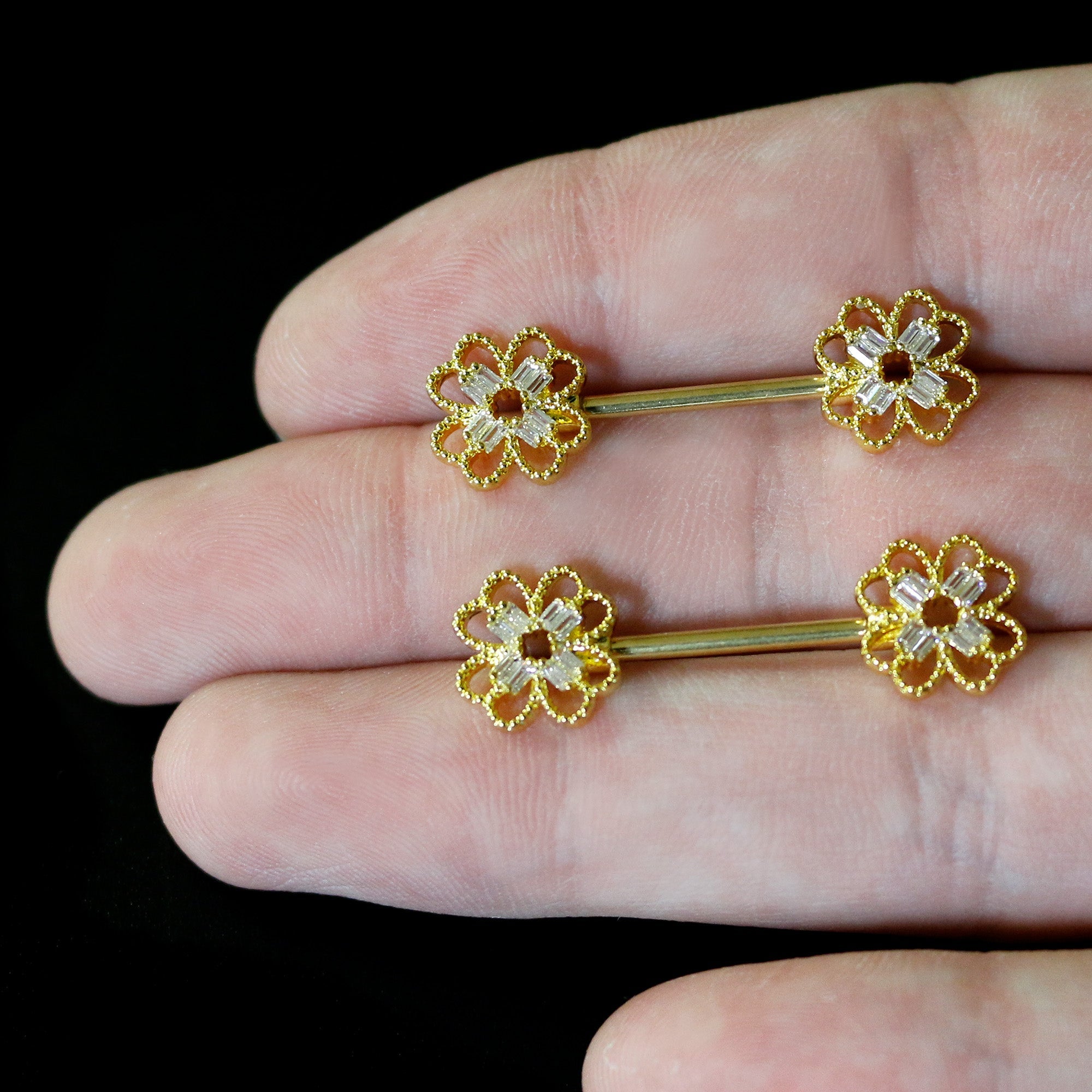 BodyCandy 14G 5/8 Clear Gem Gold Tone Texture Cross Barbell Nipple Ring Set — in-use photo