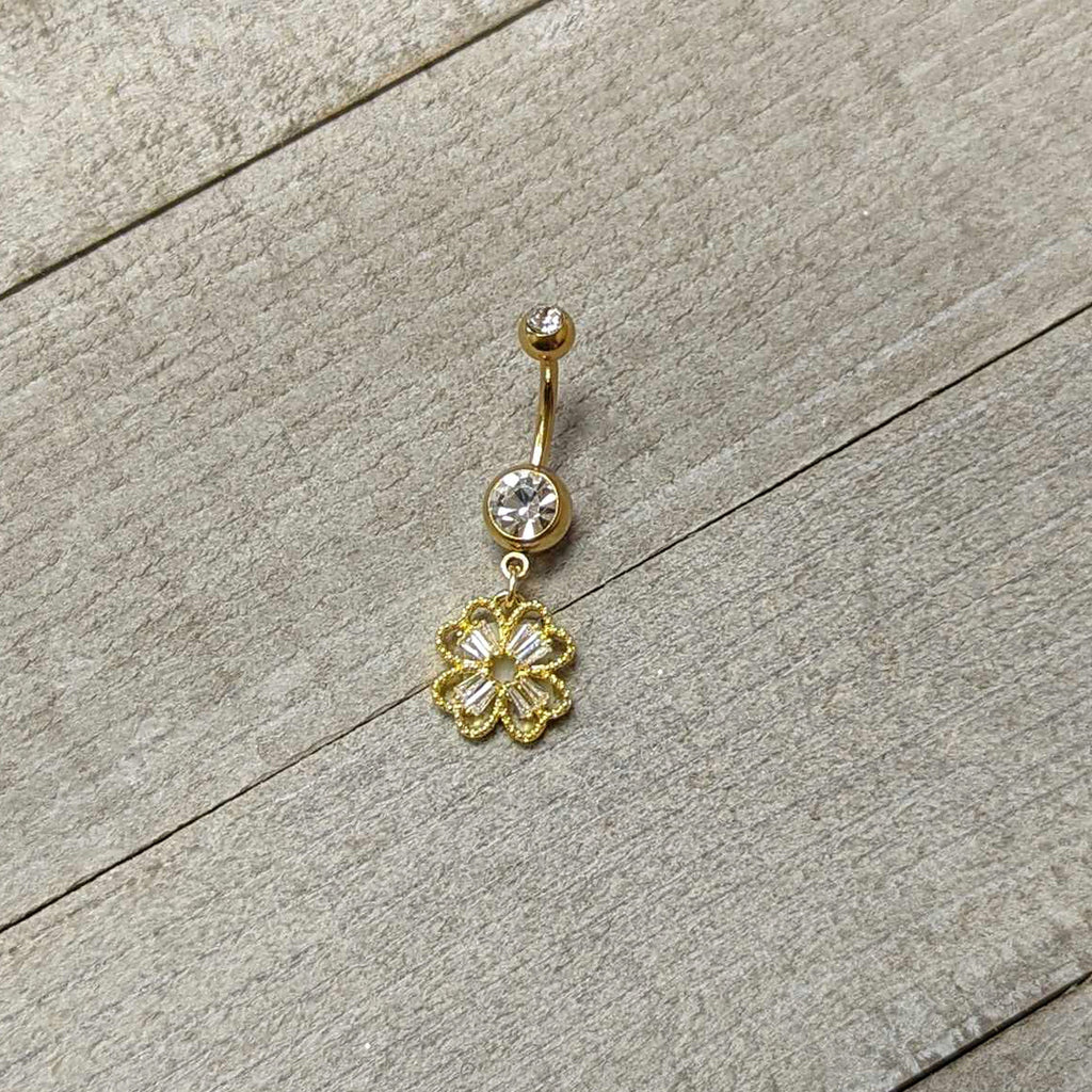 BodyCandy Clear Gem Gold Tone Elegant Textured Shamrock Dangle Belly Ring — side view