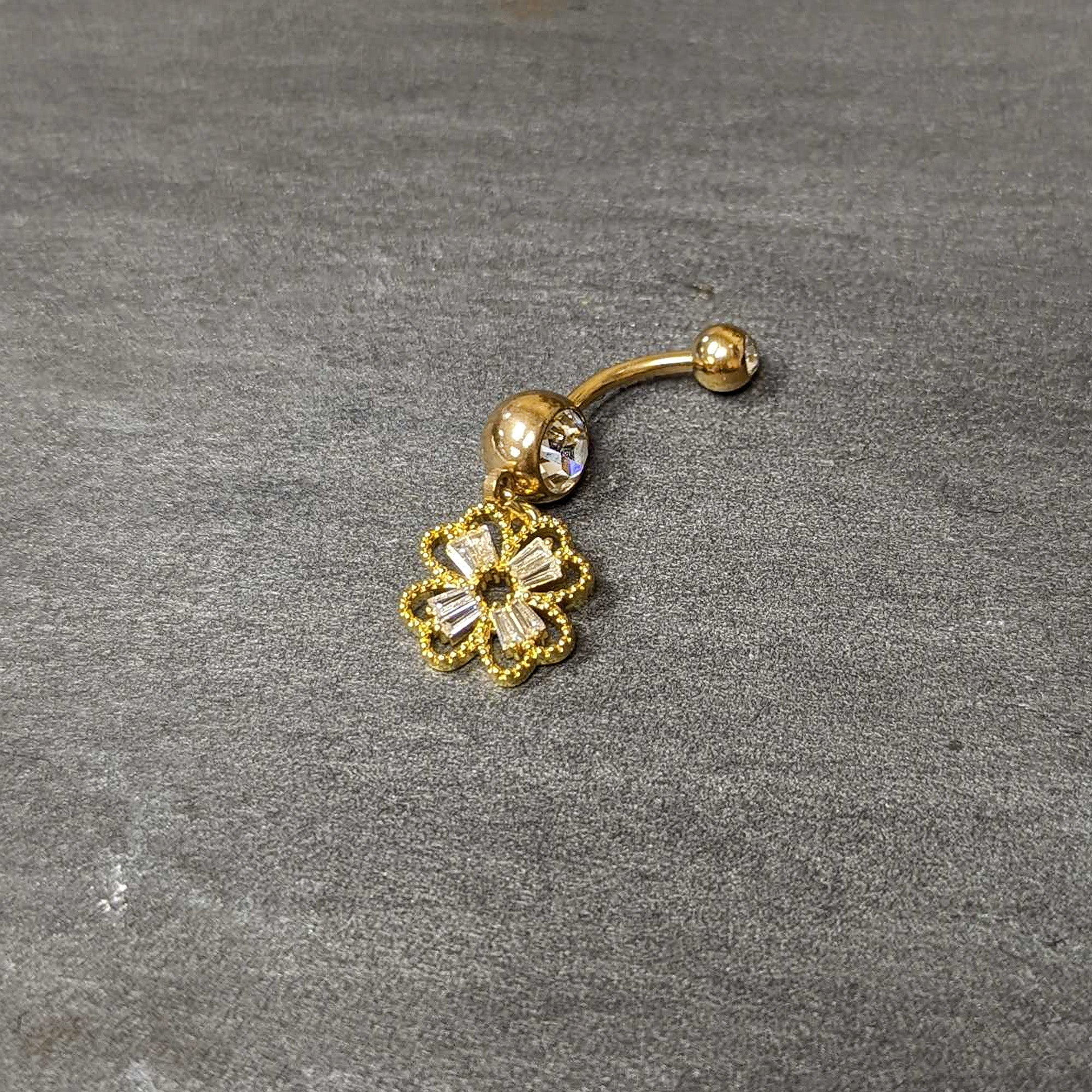 BodyCandy Clear Gem Gold Tone Elegant Textured Shamrock Dangle Belly Ring — back view