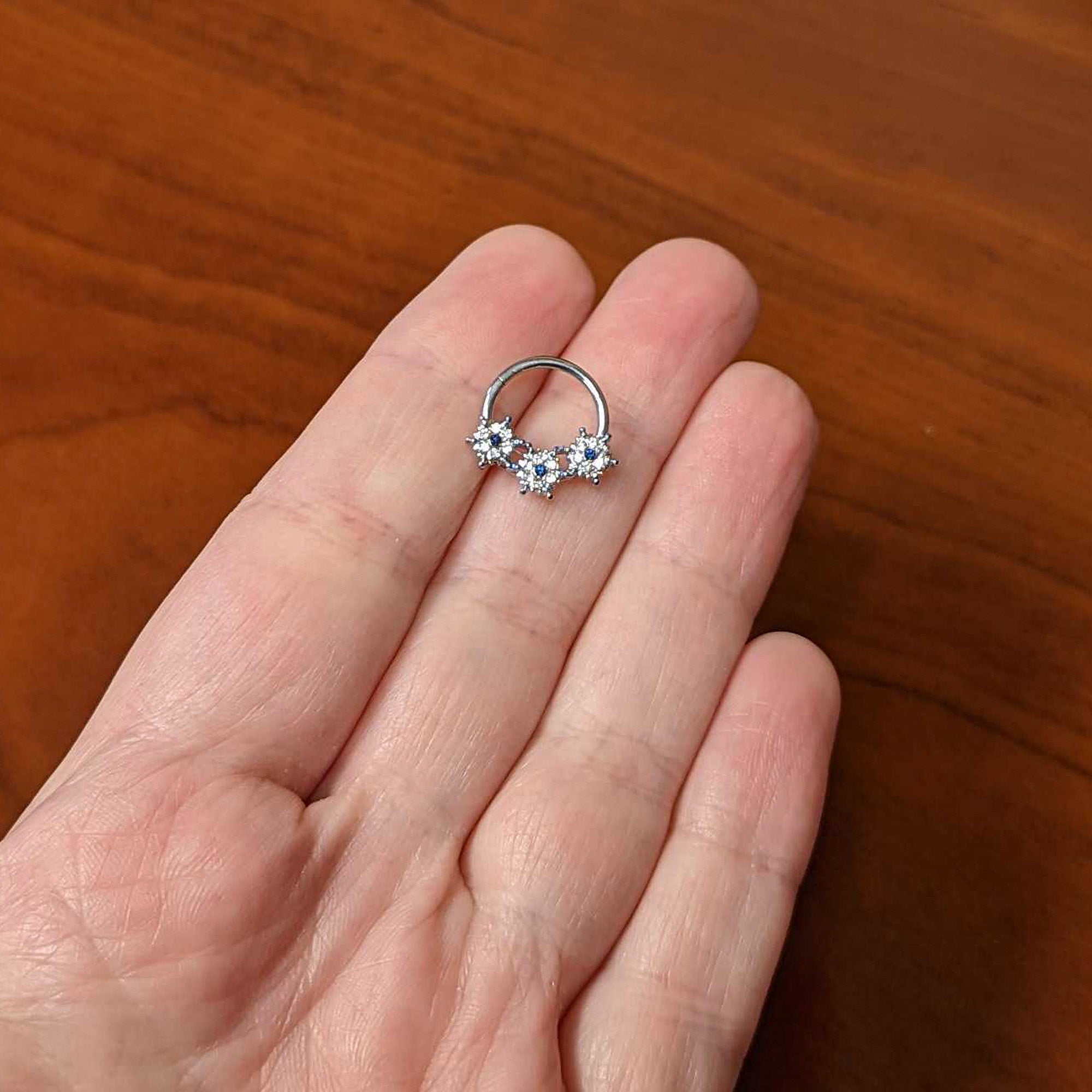 BodyCandy 16G 3/8 Clear Blue Gem Festive Trio Snowflake Hinged Segment Ring — alternative angle