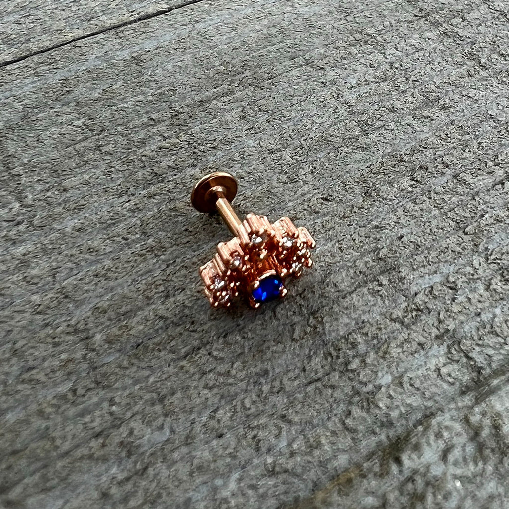 BodyCandy 16G 1/4 Blue Clear Gem Rose Gold Tone Glamour Flare Labret — in-use photo