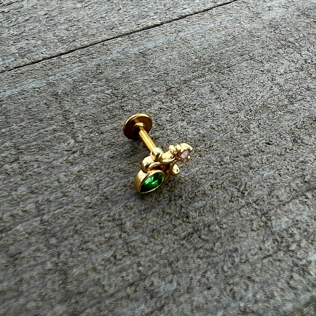 BodyCandy 16G 1/4 Green Gem Gold Tone Shades of Spring Labret — in-use photo