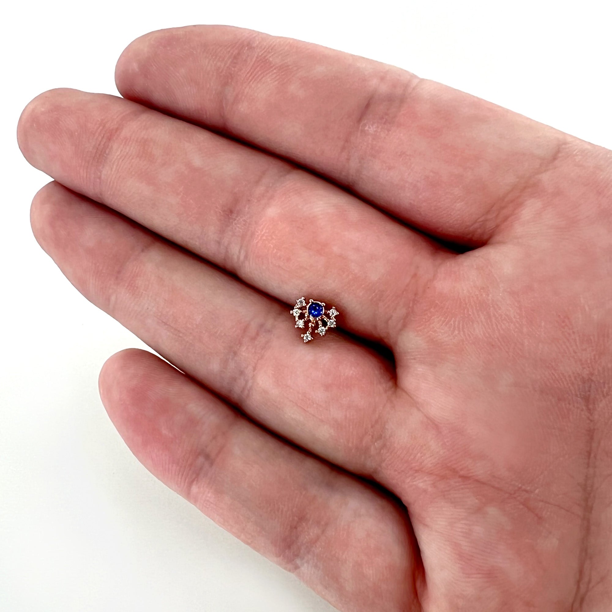 BodyCandy 20G 1/4 Blue Clear Gem Rose Gold Tone Glamour Flare Nose Bone — size reference