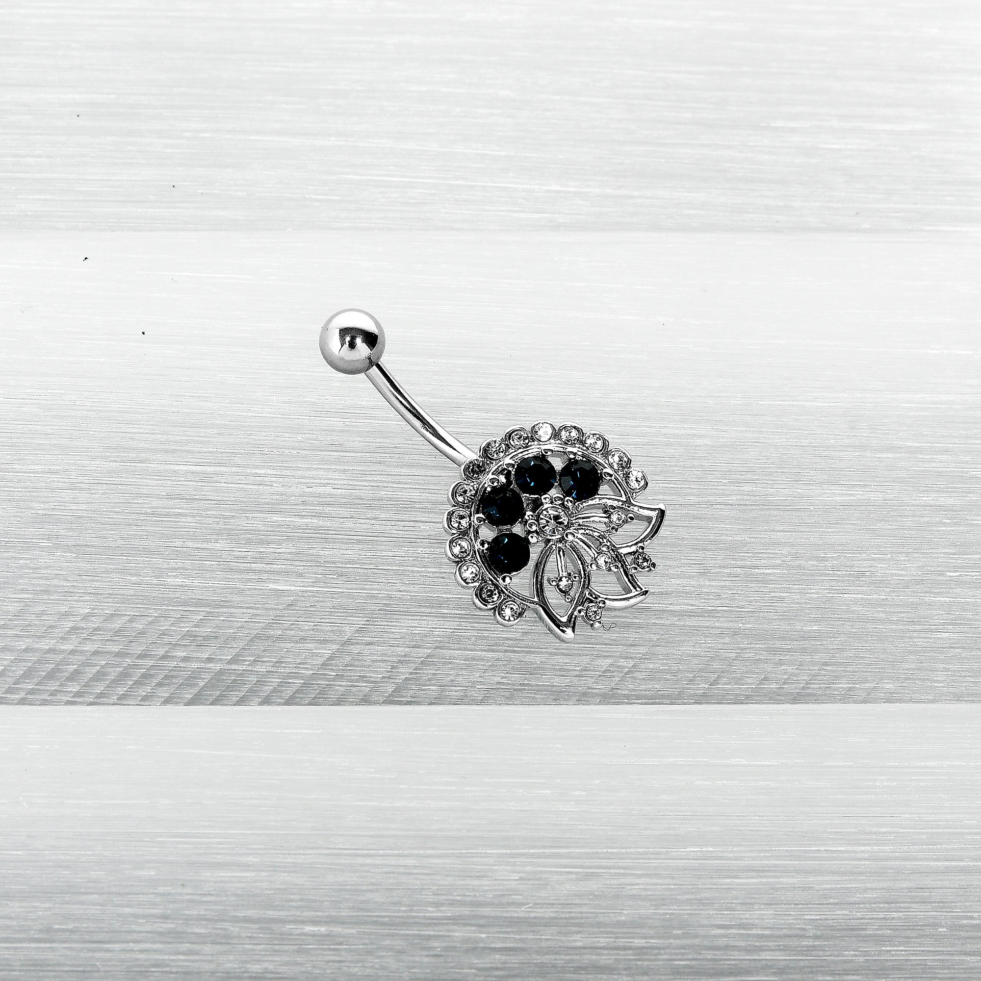 BodyCandy Clear Blue Gem Abstract Arch Belly Ring — side view
