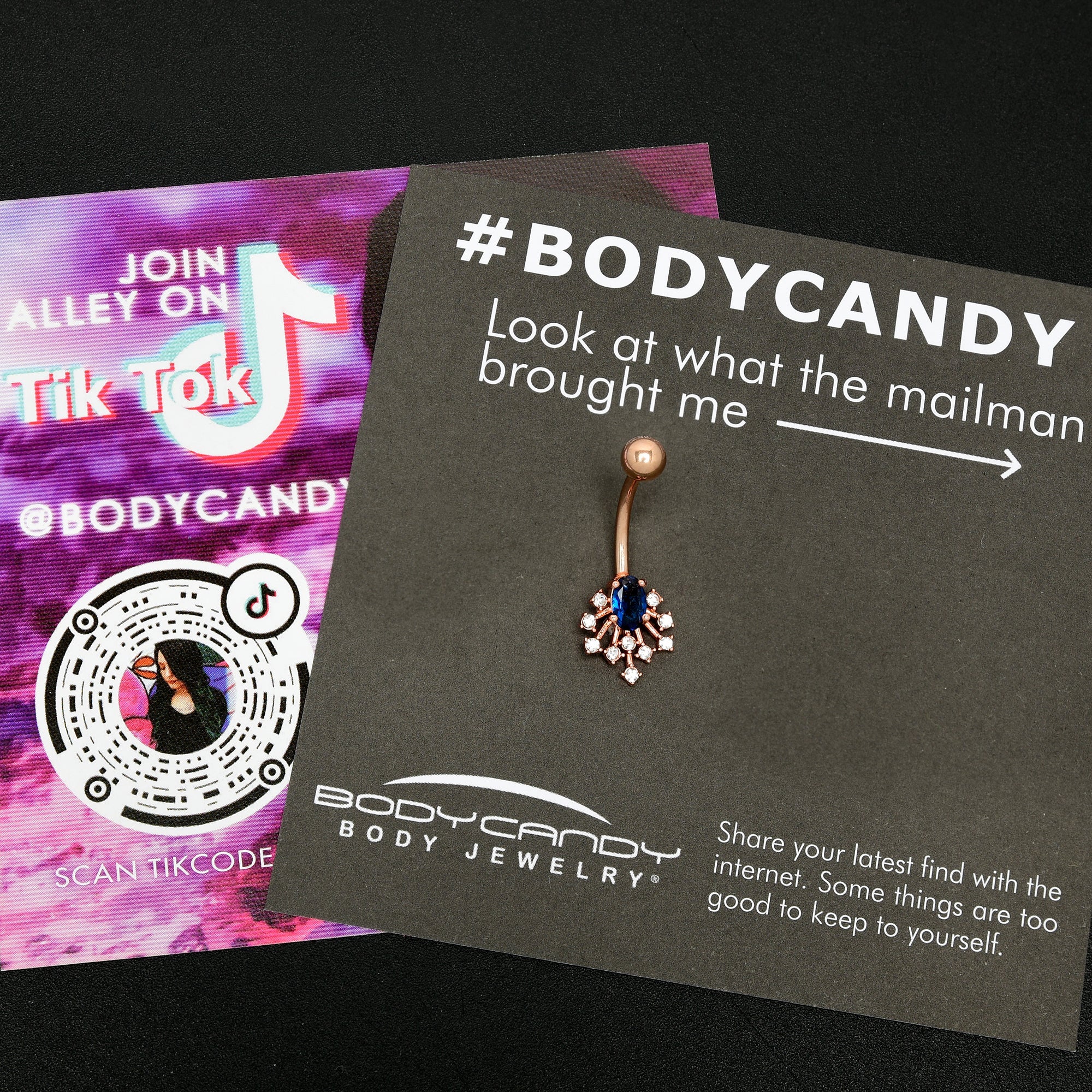 BodyCandy Clear Blue Gem Rose Gold Tone Glamour Flare Belly Ring — detail close-up