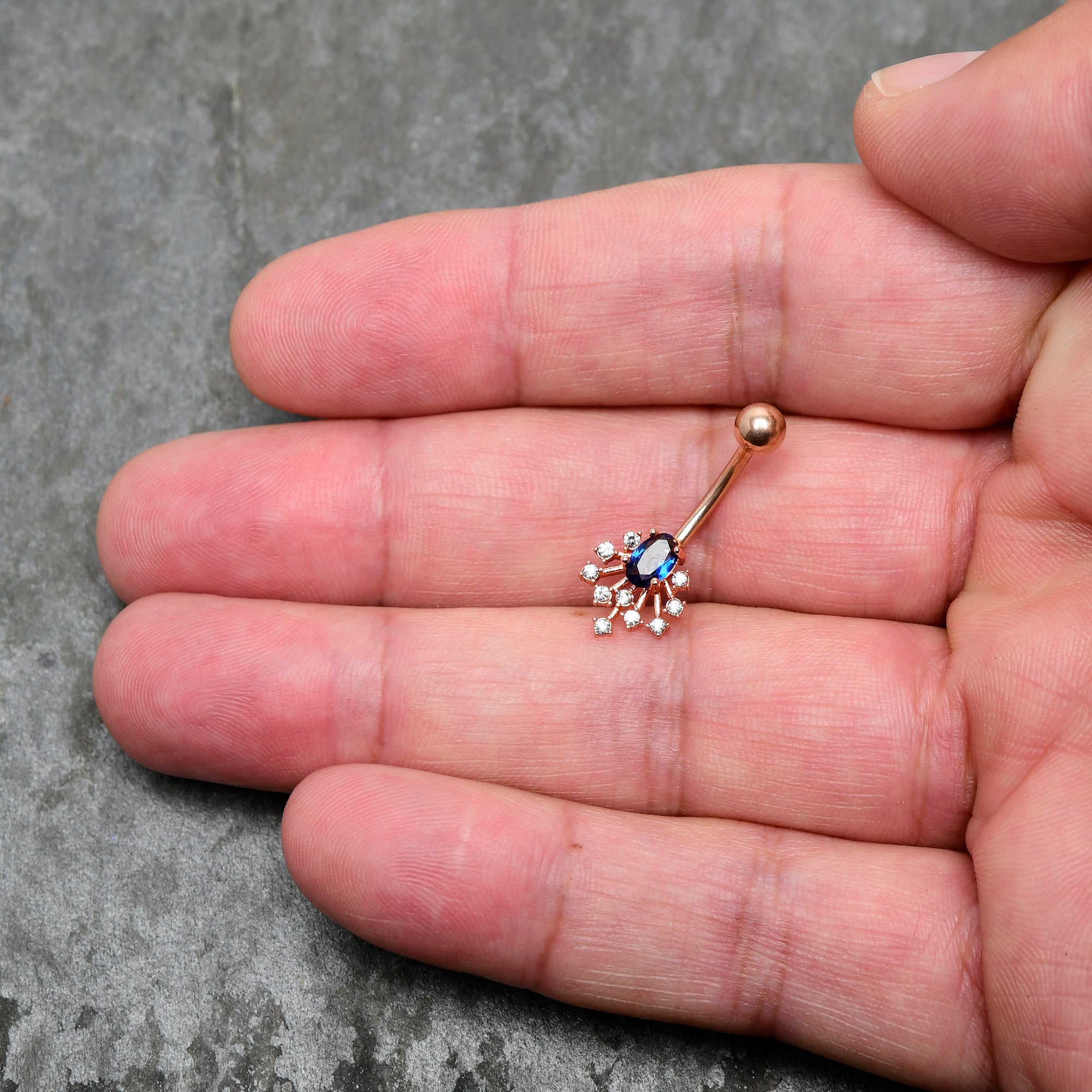 BodyCandy Clear Blue Gem Rose Gold Tone Glamour Flare Belly Ring — side view