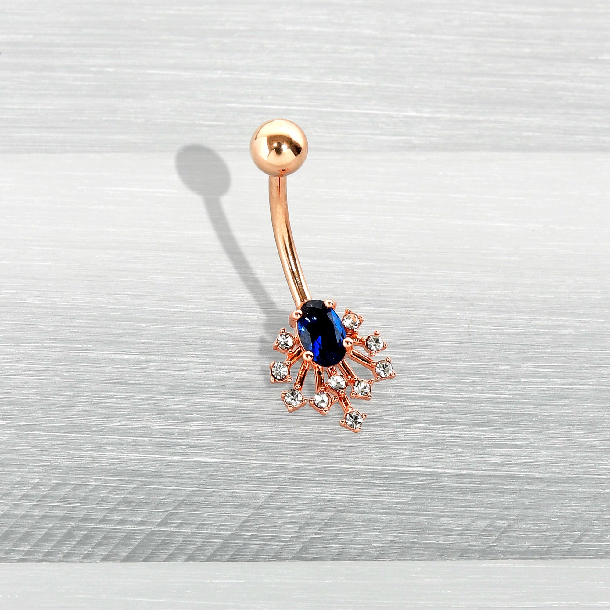 BodyCandy Clear Blue Gem Rose Gold Tone Glamour Flare Belly Ring — in-use photo