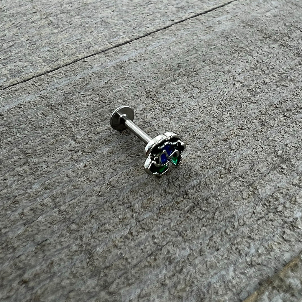 BodyCandy 16G 5/16 Spring Flower Green Blue Labret Monroe Tragus — in-use photo