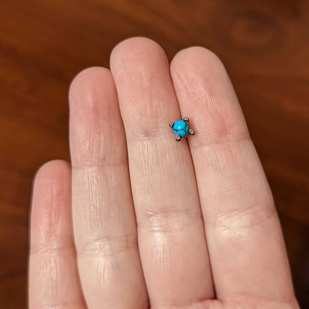 BodyCandy 20G 1/4 Blue Turquoise Claw Hand Halloween Nose Bone — back view