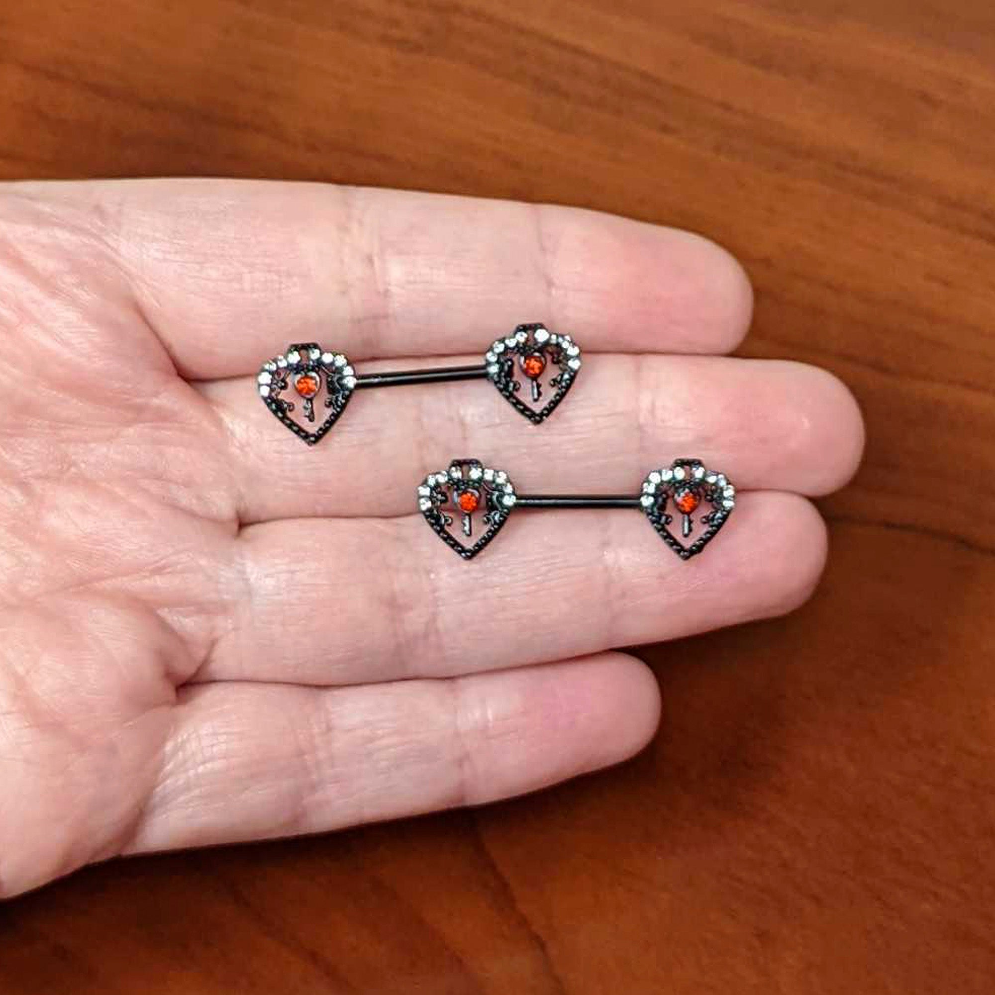 BodyCandy 14G 9/16 Red Clear Gem Black Key Heart Barbell Nipple Ring Set — back view