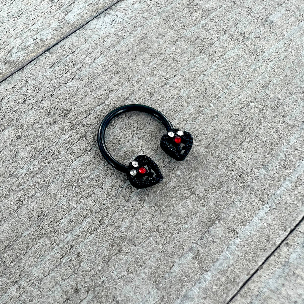BodyCandy 16G 3/8 Clear Red Gem Black Key Heart Horseshoe Circular Barbell — side view