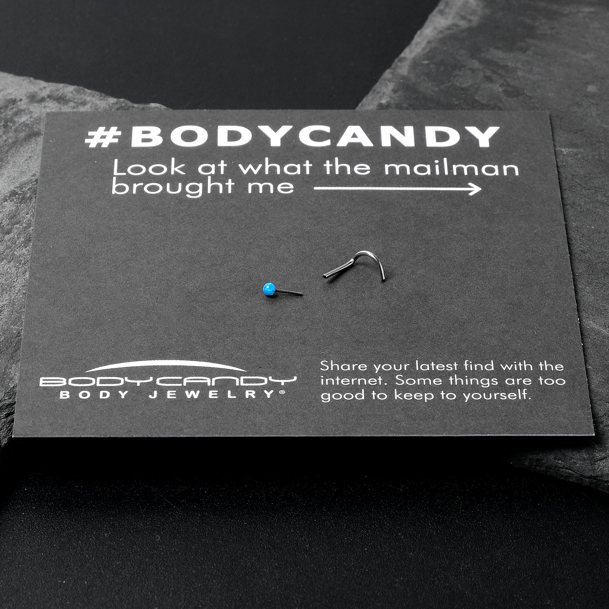 BodyCandy 20G 1/4 Blue Synth Opal G23 Titanium Threadless Left Nose Screw — in-use photo