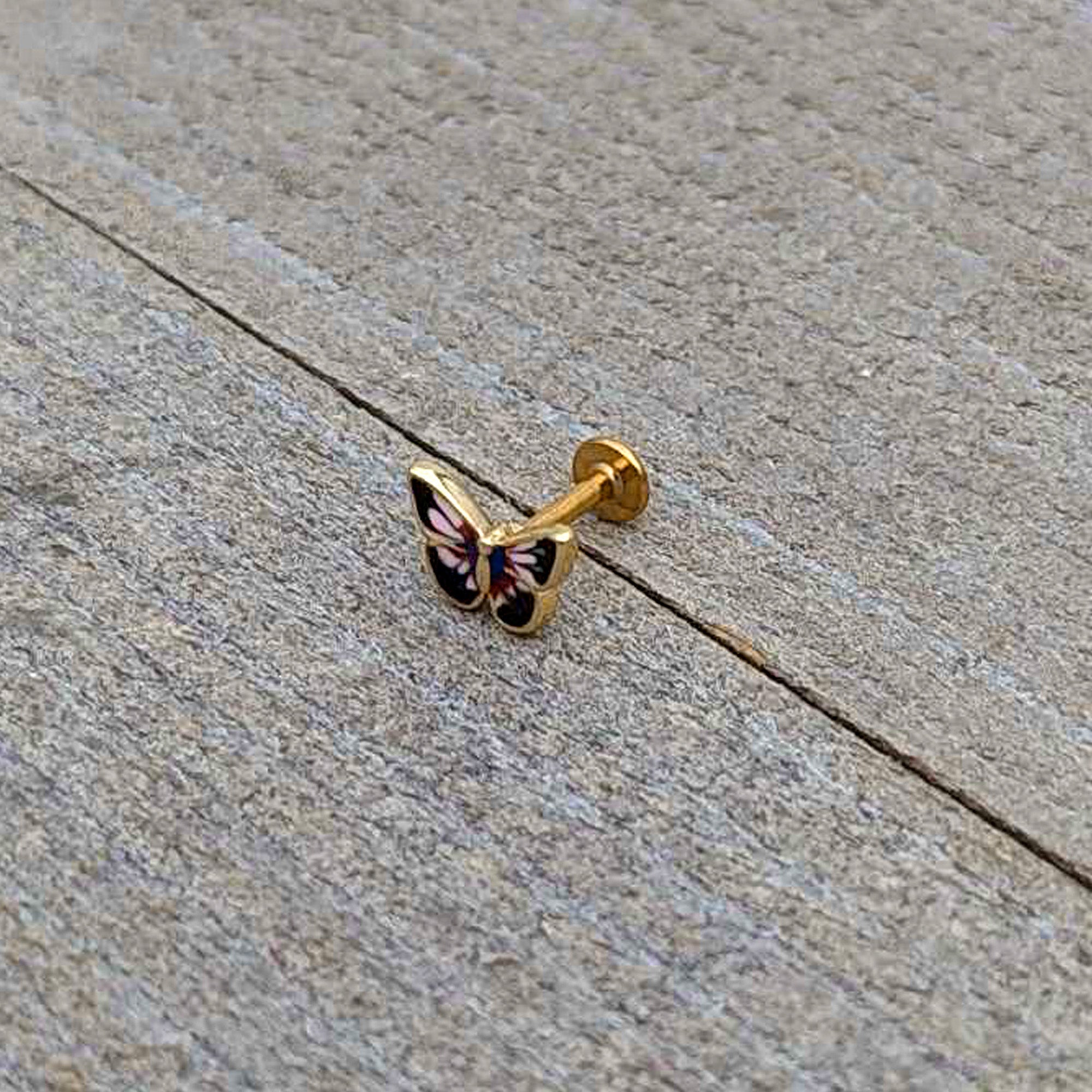 BodyCandy 16G 1/4 Gold Tone Red Pink Blue Butterfly Labret Monroe Tragus — in-use photo
