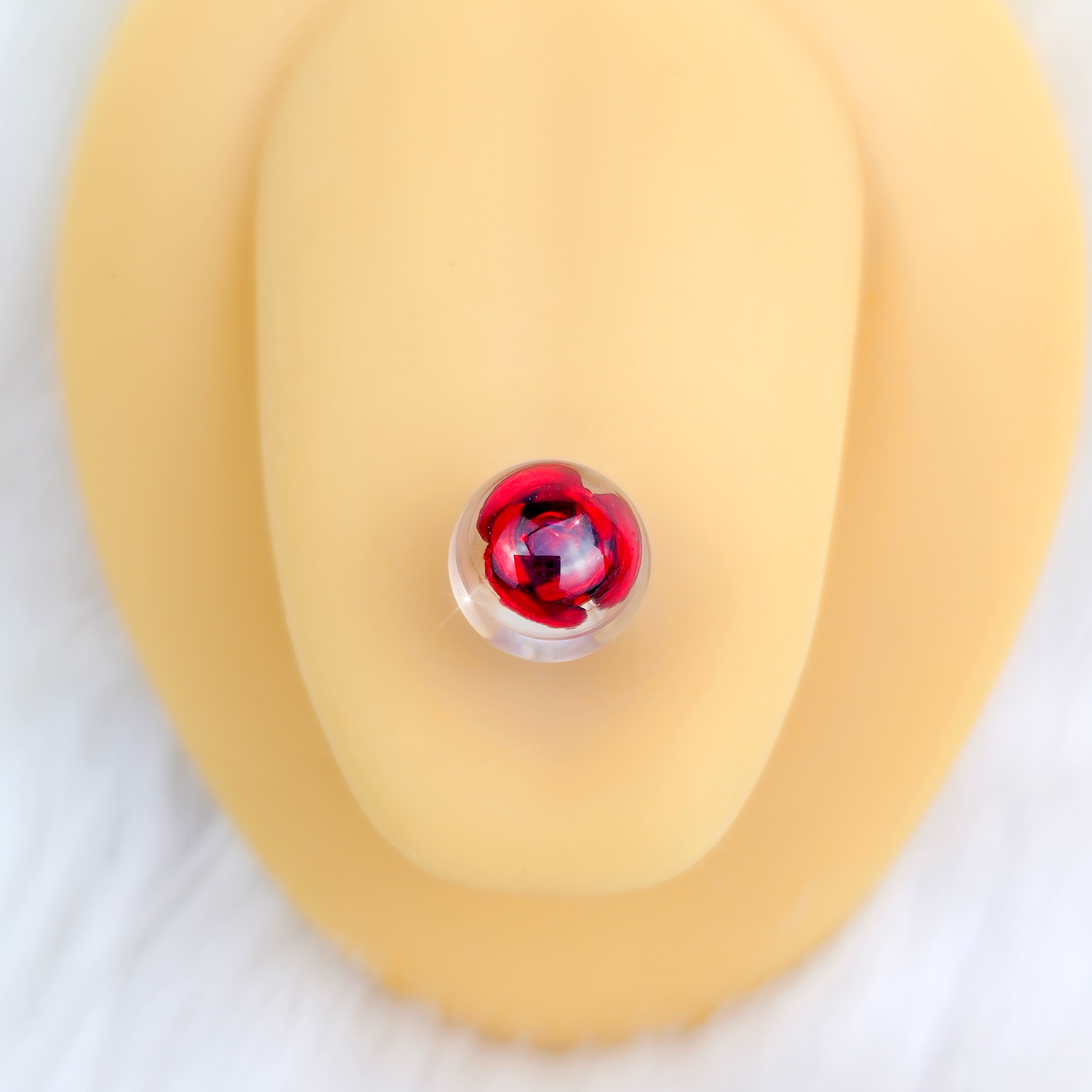 BodyCandy Bubble Rose Red Barbell Tongue Ring — detail close-up