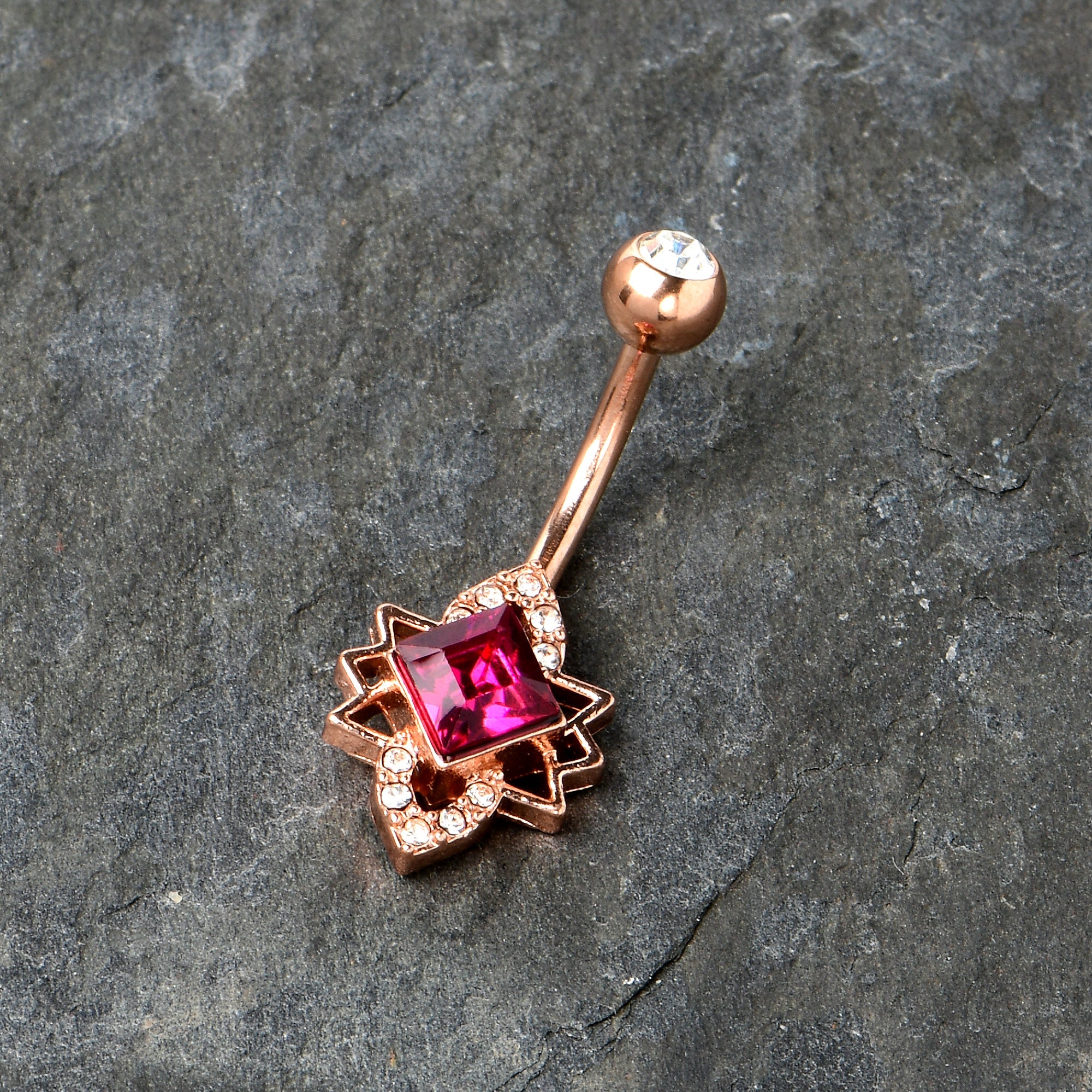 BodyCandy Clear Red Gem Rose Gold Tone Octagram Star Belly Ring — side view