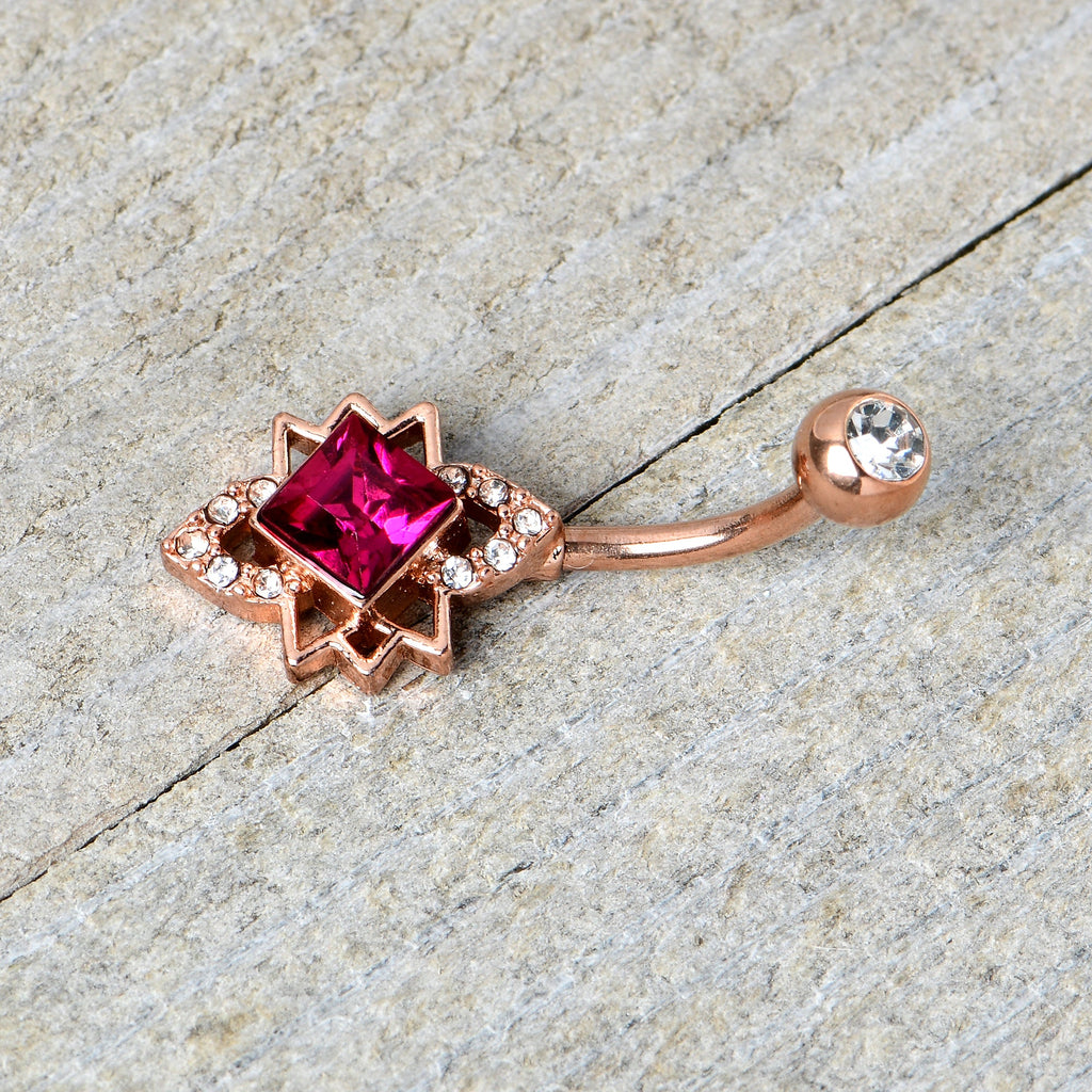 BodyCandy Clear Red Gem Rose Gold Tone Octagram Star Belly Ring — in-use photo