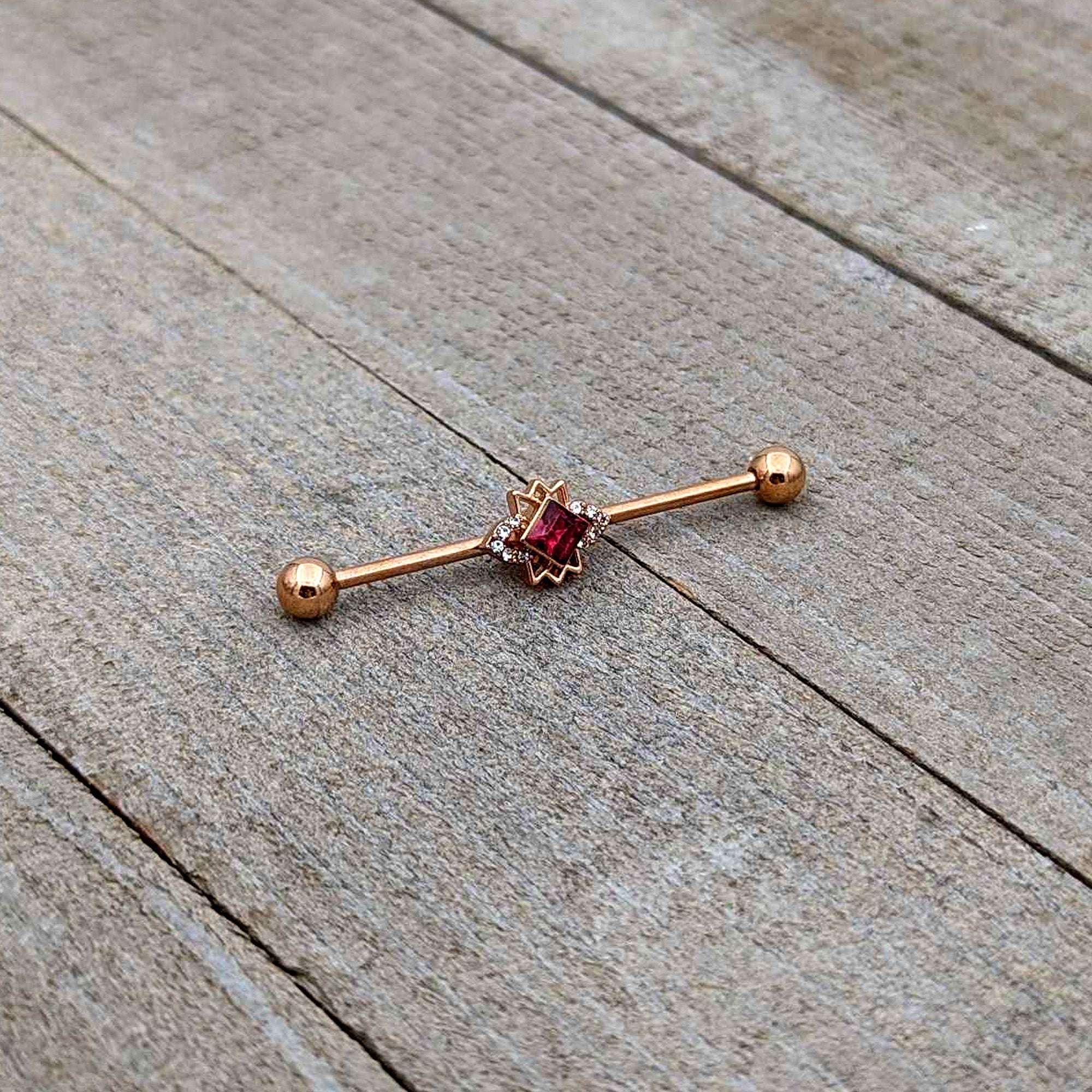 BodyCandy 14G Red Gem Rose Gold Tone Octogram Star Industrial Barbell 38mm — back view