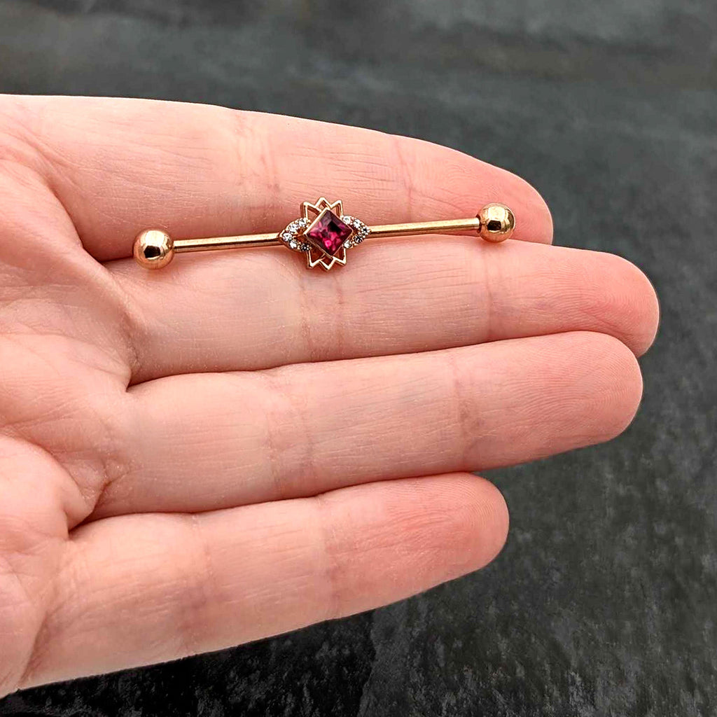 BodyCandy 14G Red Gem Rose Gold Tone Octogram Star Industrial Barbell 38mm — in-use photo