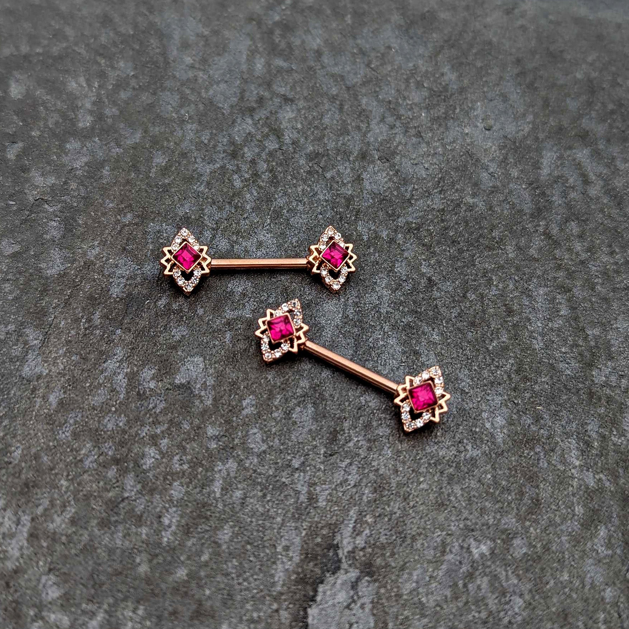 BodyCandy 14G 9/16 Red Gem Rosy Tone Octogram Star Barbell Nipple Ring Set — side view
