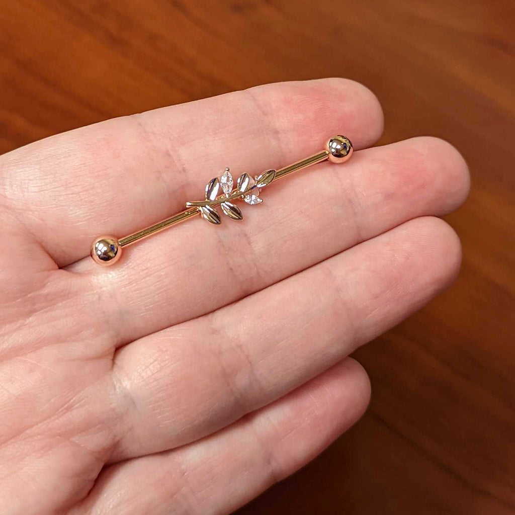 BodyCandy 14G Clear CZ Gem Rose Gold Hue Simple Leaf Industrial Barbell 38mm — lifestyle context