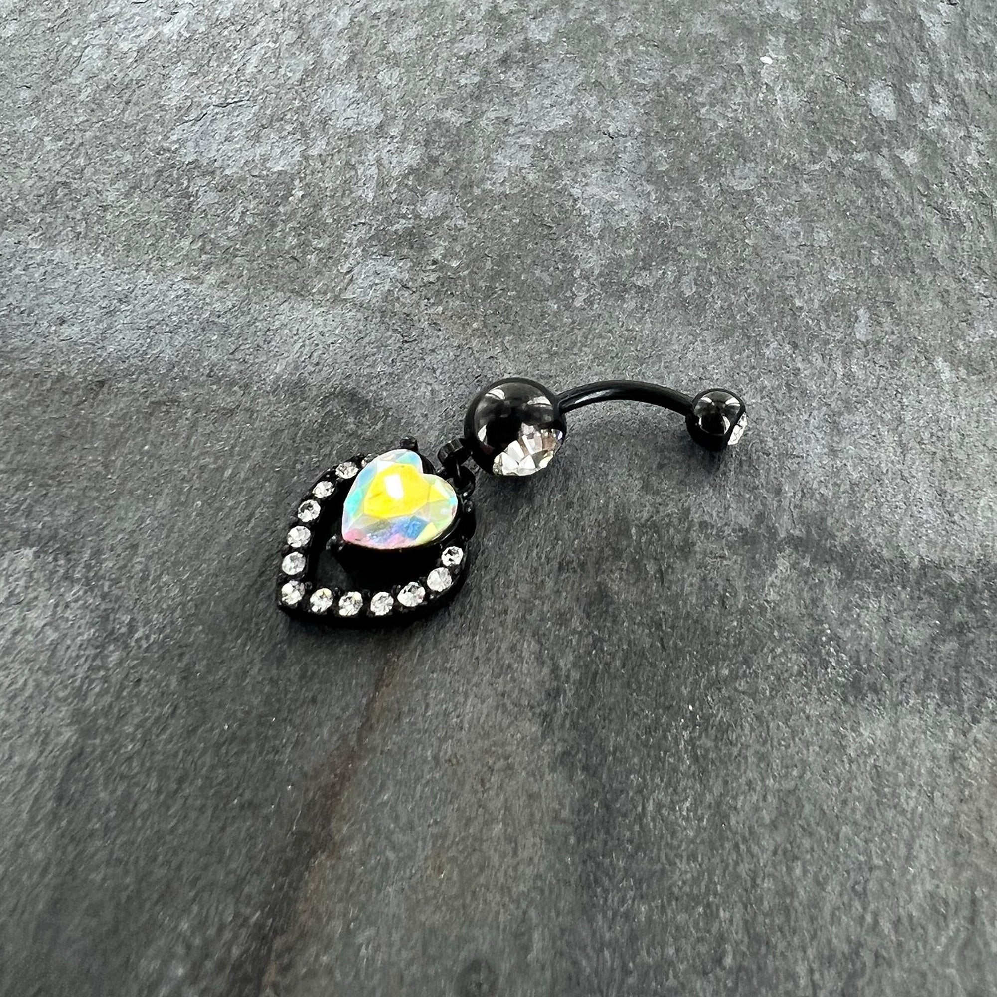 BodyCandy Clear Aurora Gem Black Rococo Heart Dangle Belly Ring — detail close-up